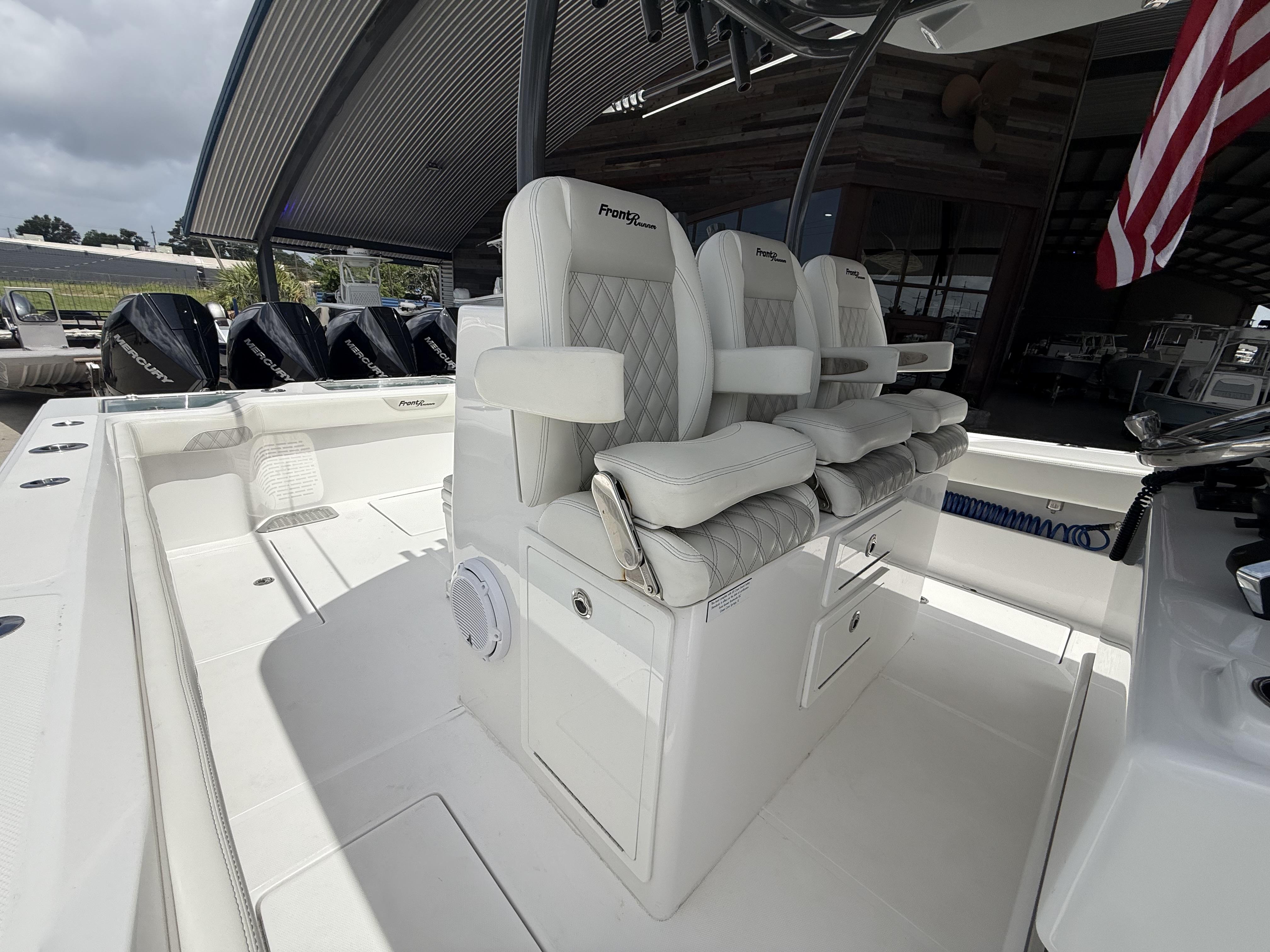2024 Front Runner 39 CC boat interior with luxurious seating and multiple outboard engines.