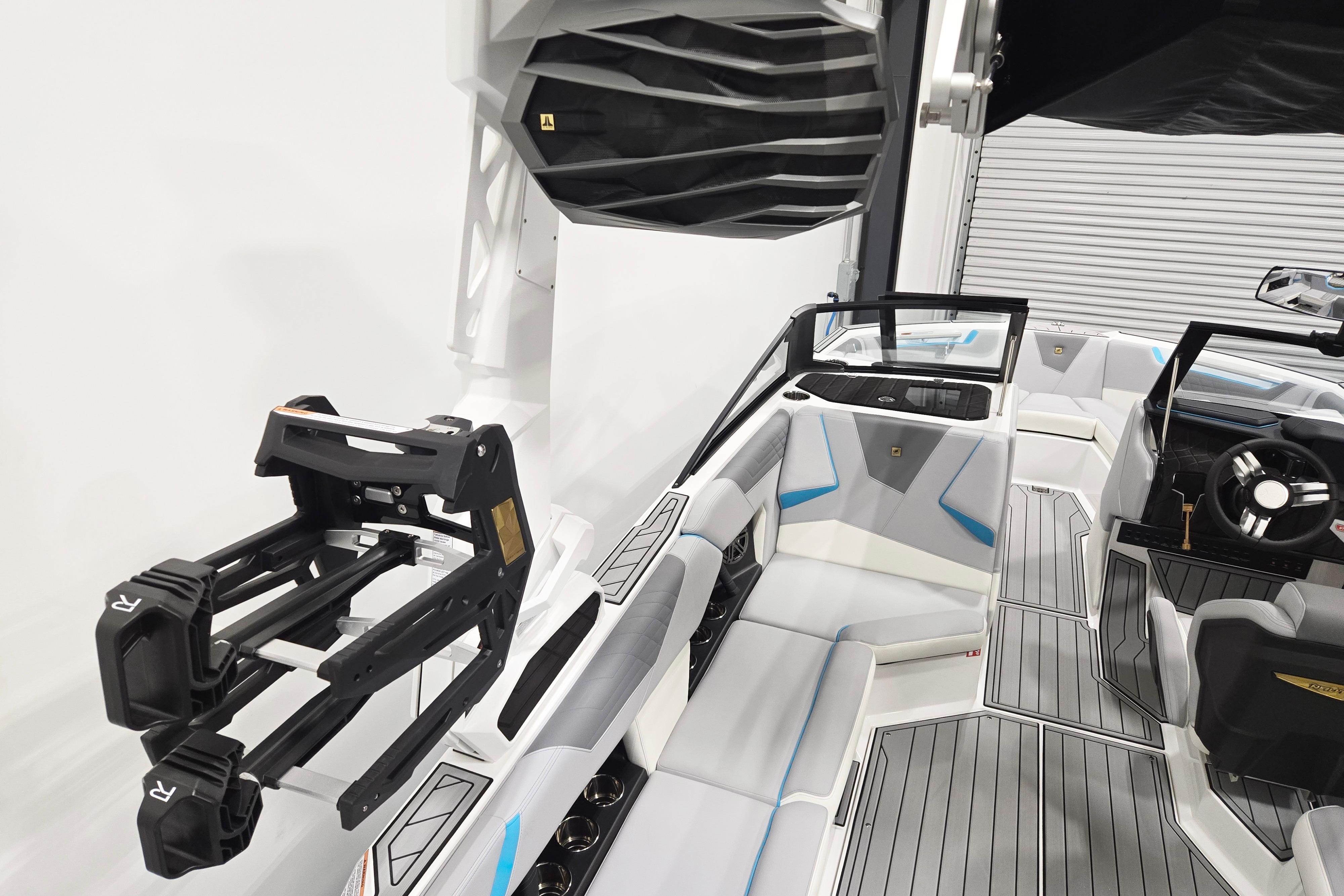 2026 Nautique Super Air Nautique S21 interior with sleek seating and advanced wakeboard rack.