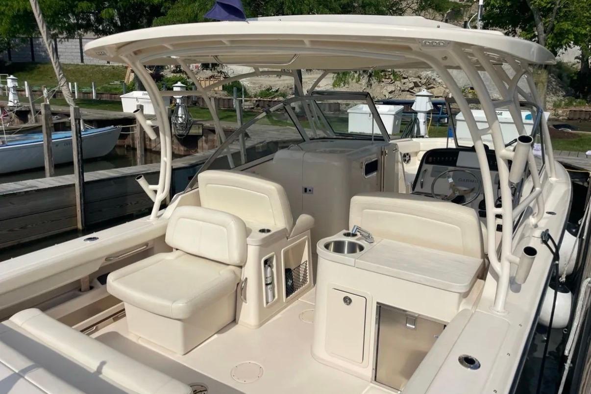 2019 Grady-White Freedom 307 boat interior with seating and helm station.