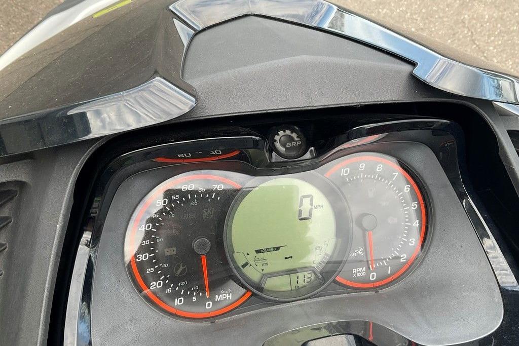 Dashboard of a 2014 Sea-Doo Wake Pro 215, showing speedometer and tachometer.