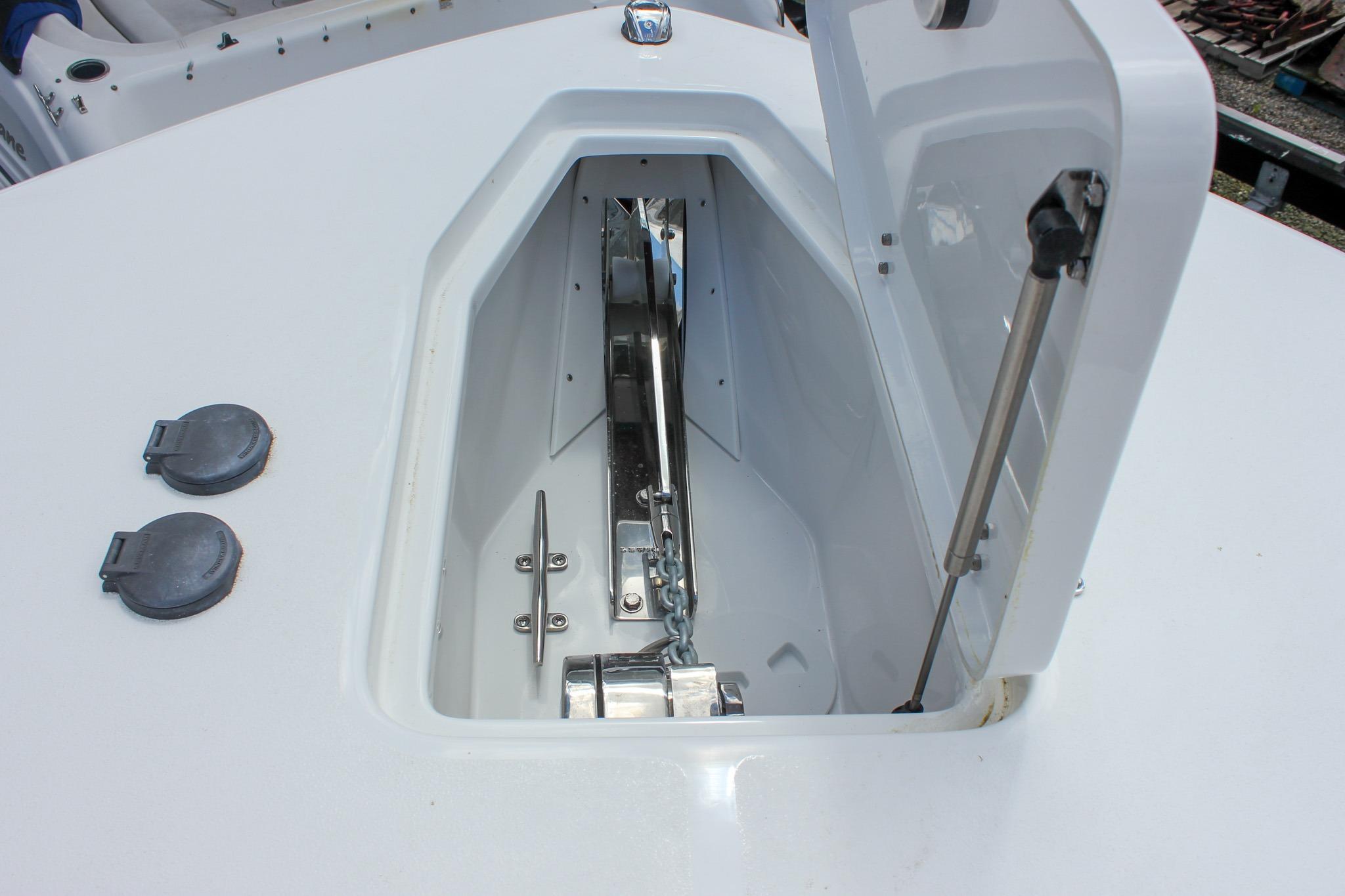 Anchor storage compartment on 2027 Sea Hunt Ultra 275 Coffin Box boat.