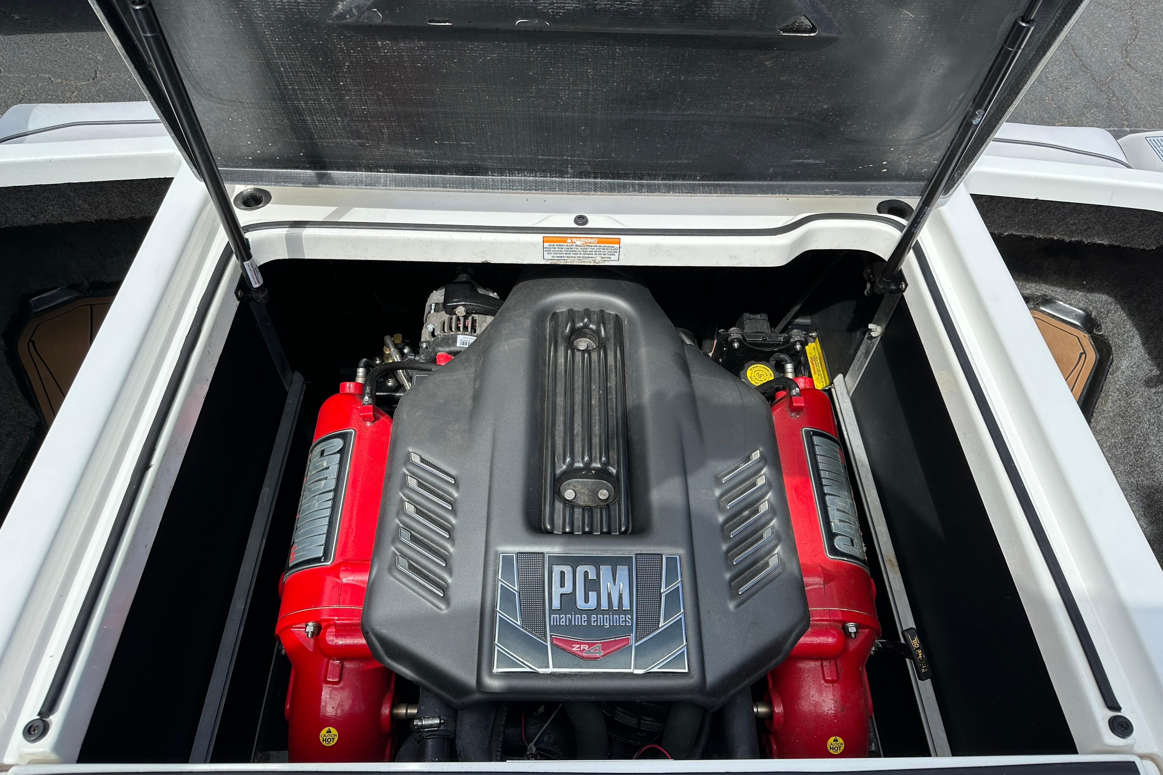 Engine compartment of 2017 Nautique Super Air Nautique GS20 with PCM marine engine.