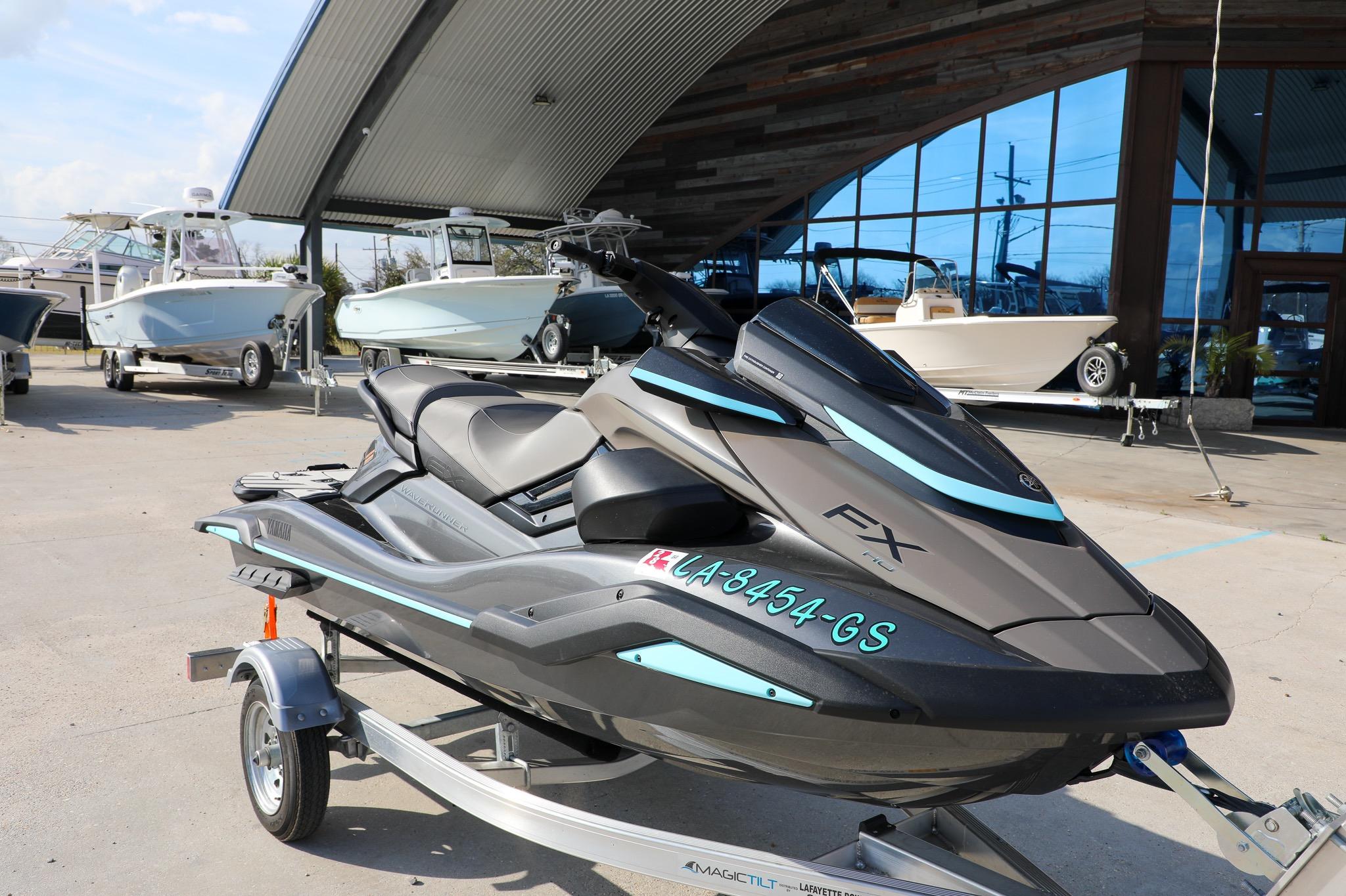 2025 Yamaha WaveRunner FX HO jet ski on trailer, parked outside a showroom.