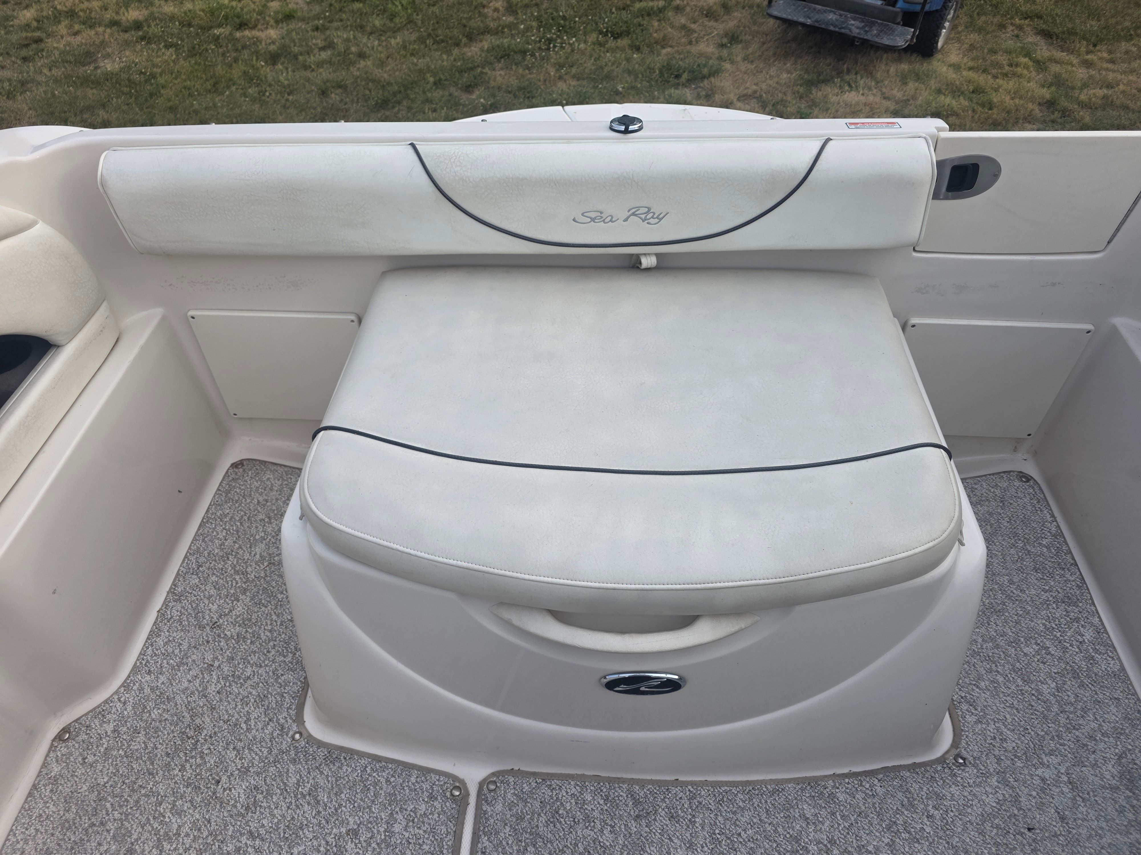 Seating area on a 2004 Sea Ray 225 Weekender boat.