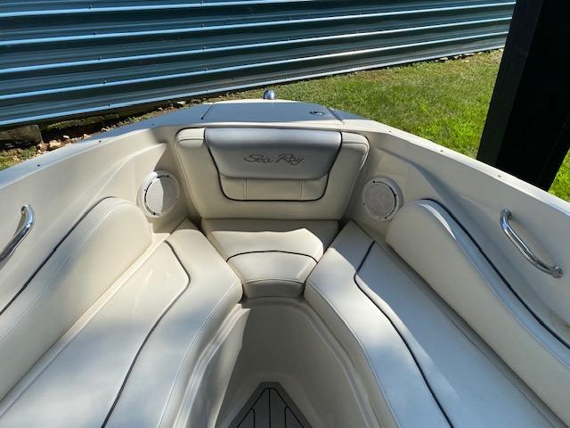 2010 Sea Ray 230 Select boat interior with white cushioned seating.