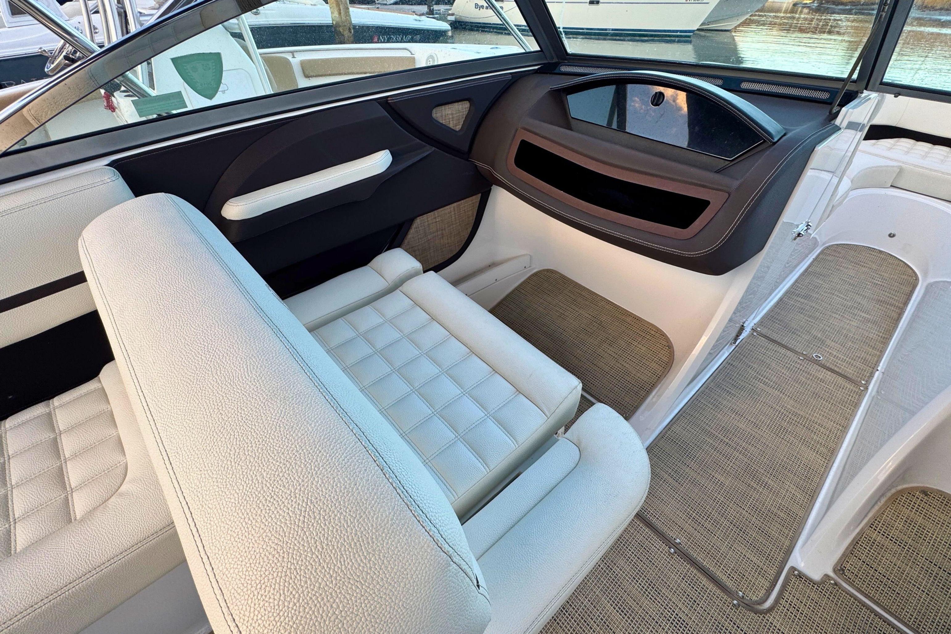 2019 Cobalt R3 boat interior with white seating and modern dashboard design.
