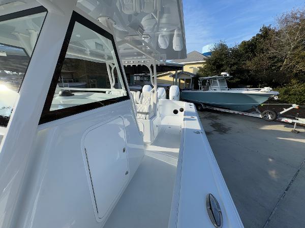 2025 Yellowfin 39 Offshore boat, sleek design, docked outdoors, clear sky.