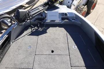 2026 Ranger 2080MS boat deck with Garmin electronics and storage compartments.