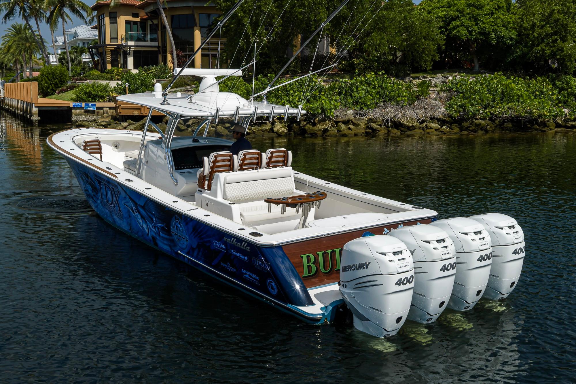 2020 Valhalla Boatworks V-41 with four Mercury 400 engines on a scenic waterway.