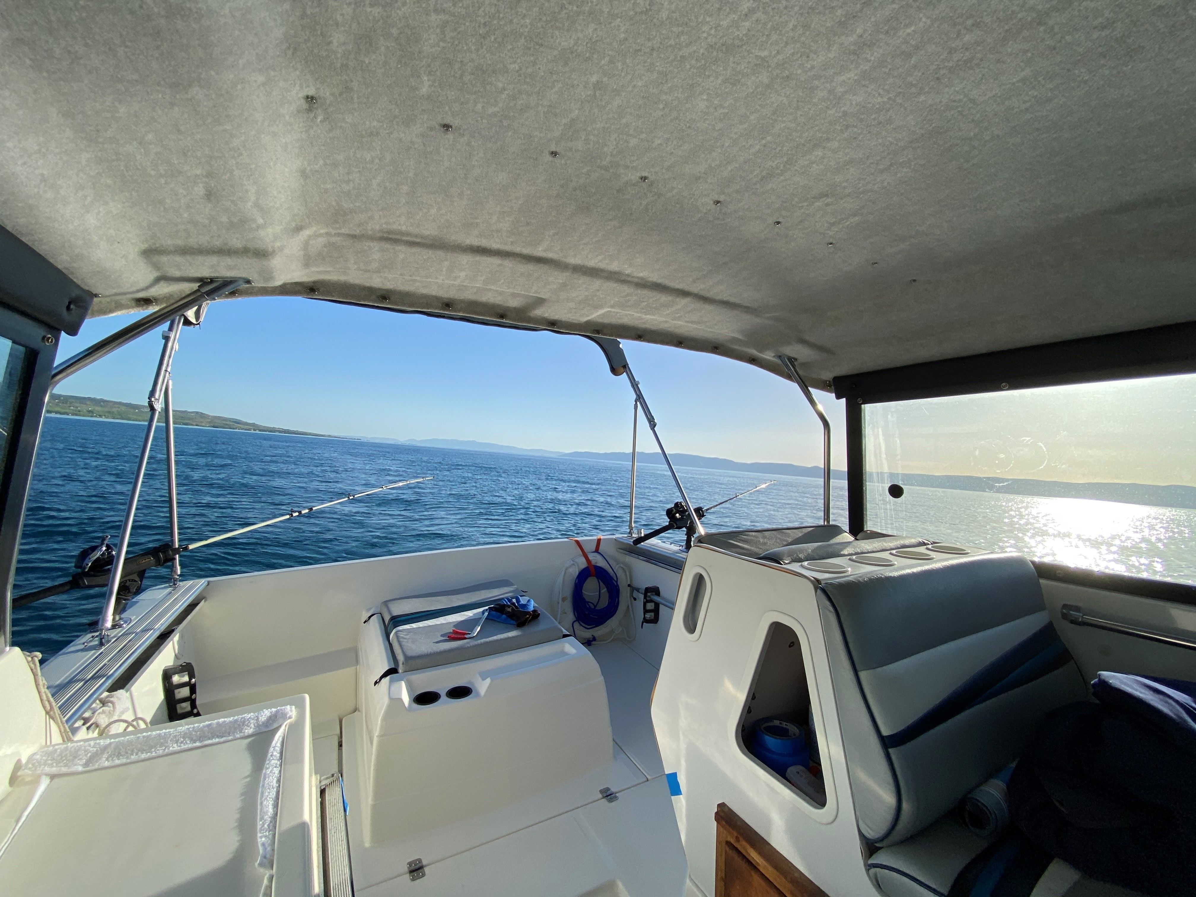 Interior view of a Bayliner 2159 boat on the water.