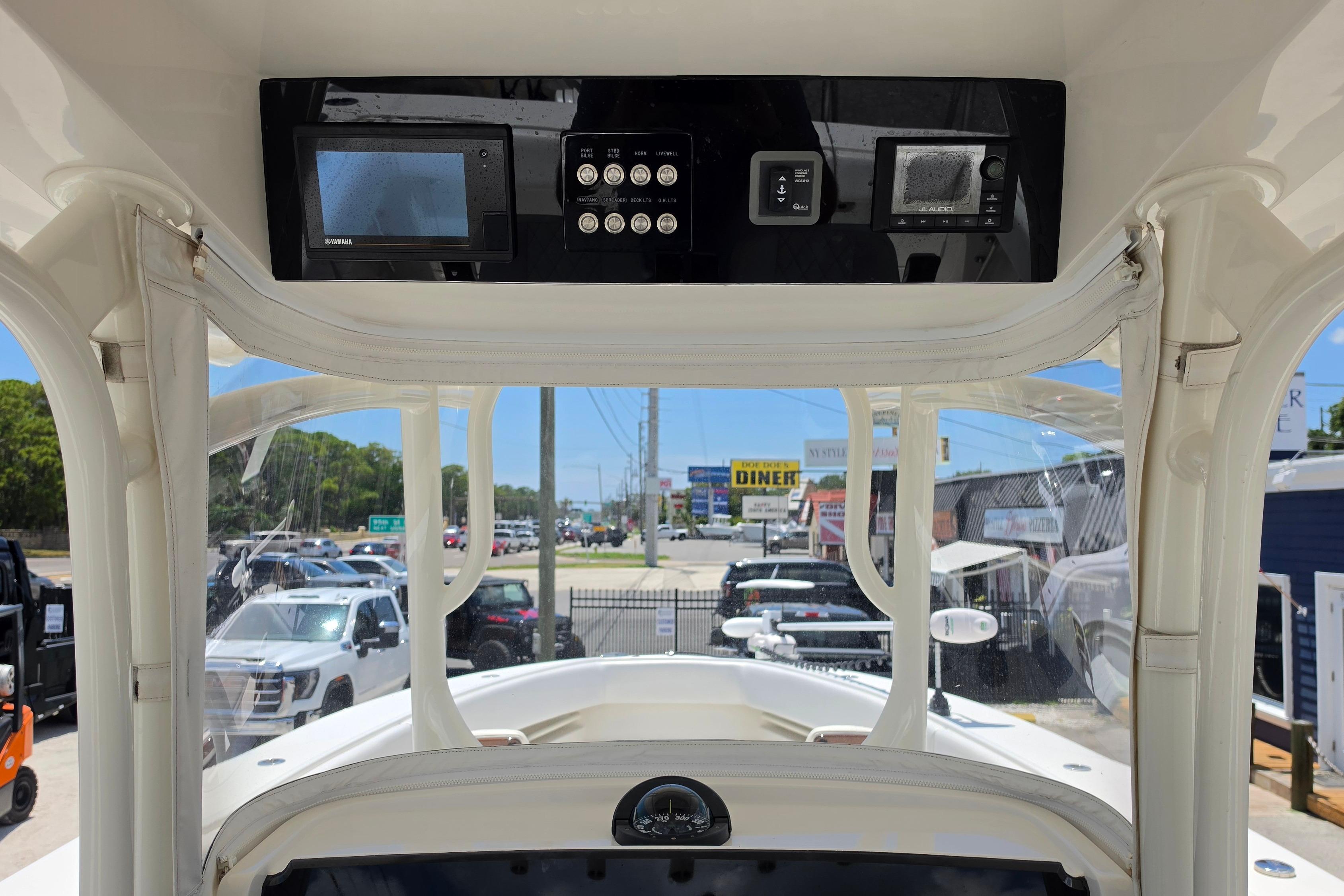 2020 Jupiter 34 HFS boat dashboard with electronic controls and display screens.