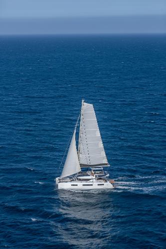 Sailing Lagoon 51 ICONIC catamaran on open sea, 2025 model.