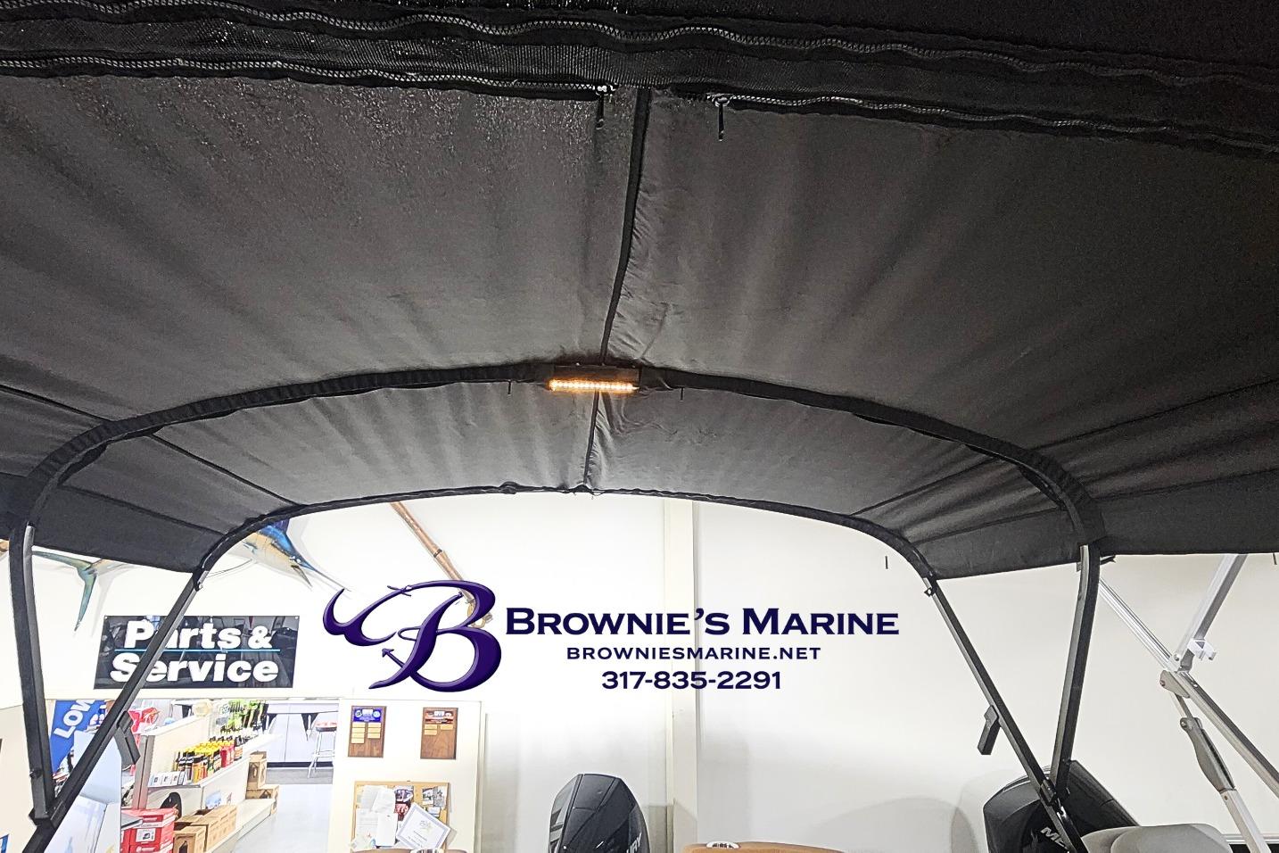 2026 Regency 250 DL boat canopy at Brownie's Marine showroom.