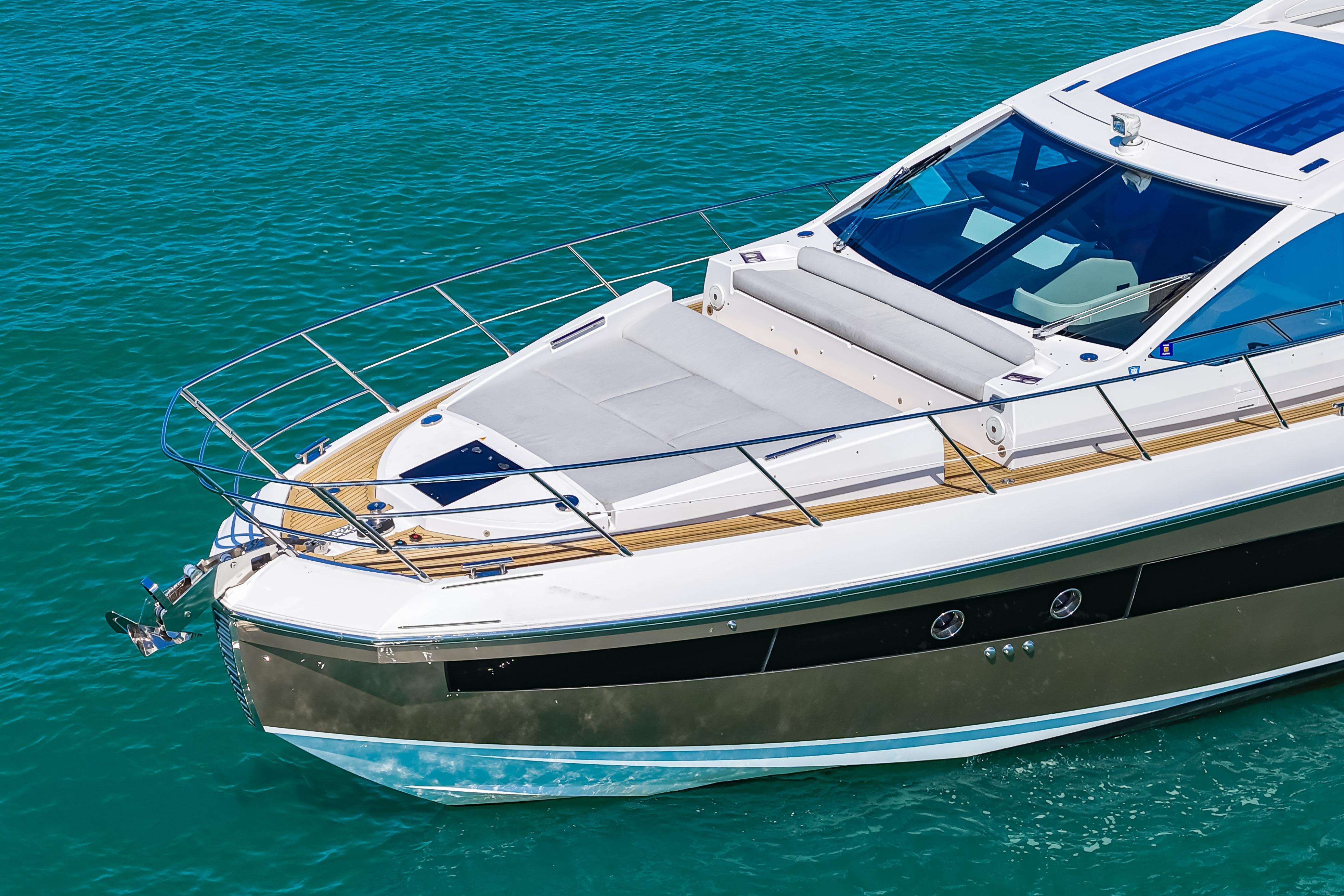 2020 Azimut S6 yacht cruising on clear blue water.