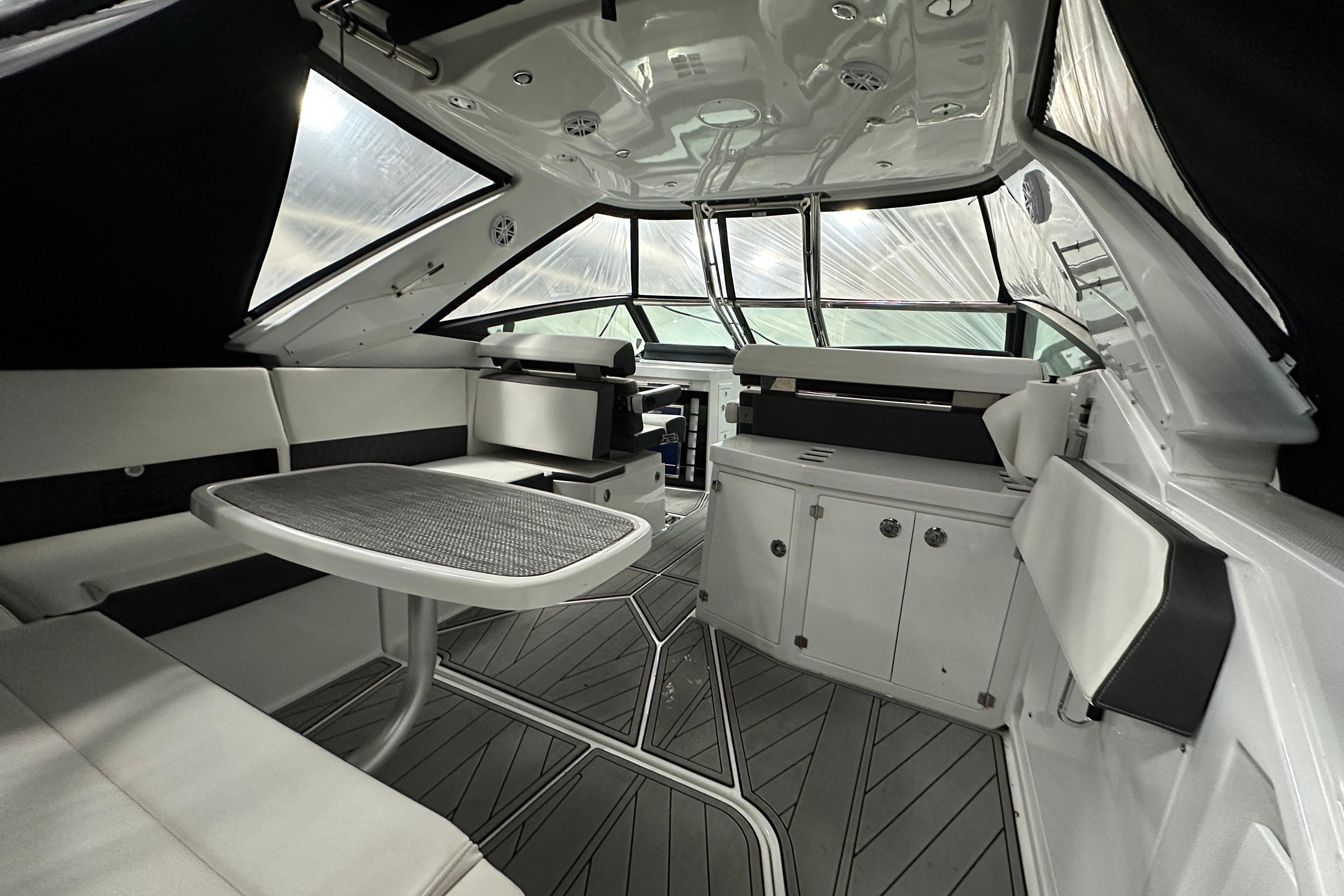 Luxurious interior of 2023 Monterey 378SS Super Sport boat with sleek seating and modern design.