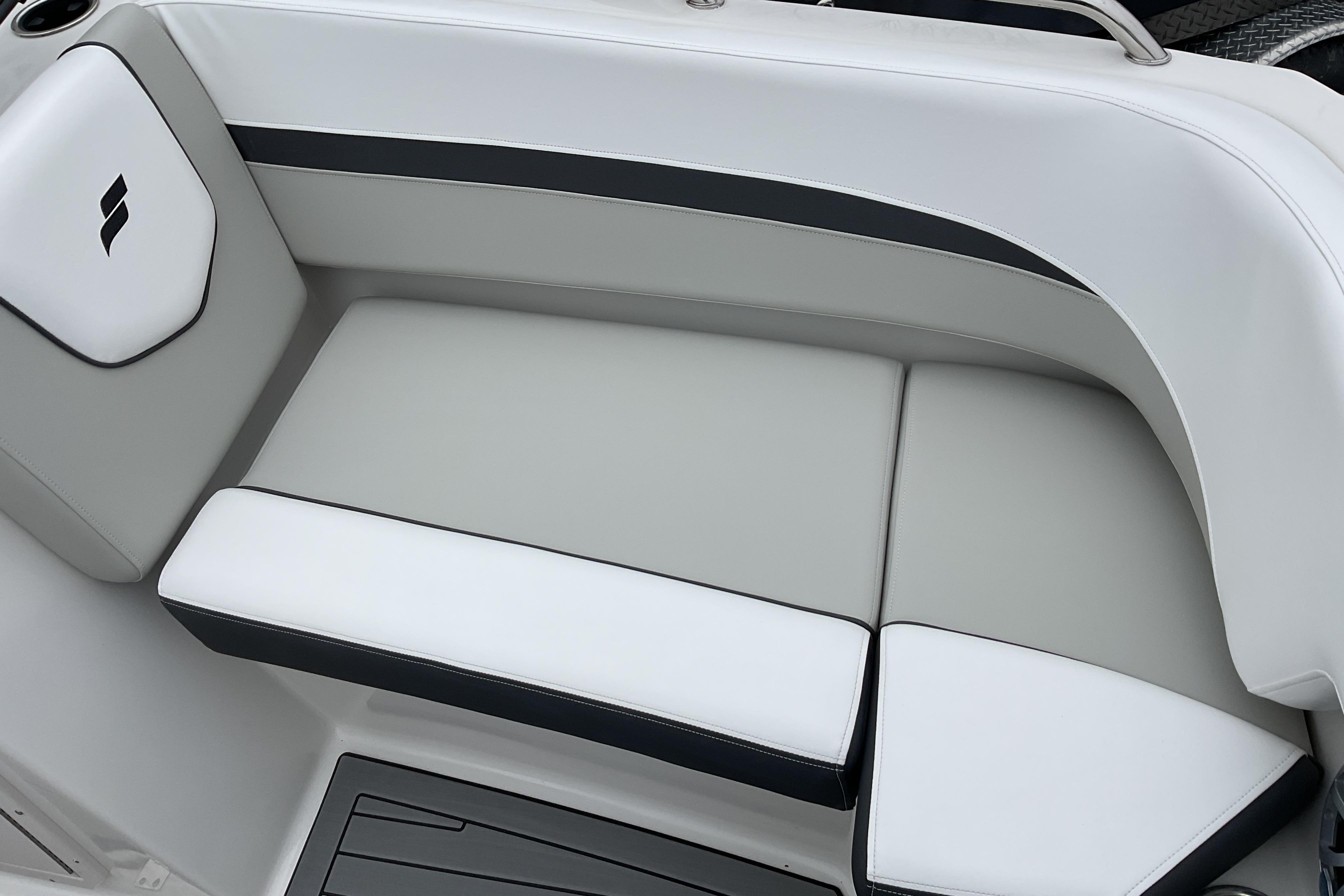 2026 Starcraft SVX 210 DC OB boat seating, featuring sleek white and gray upholstery.