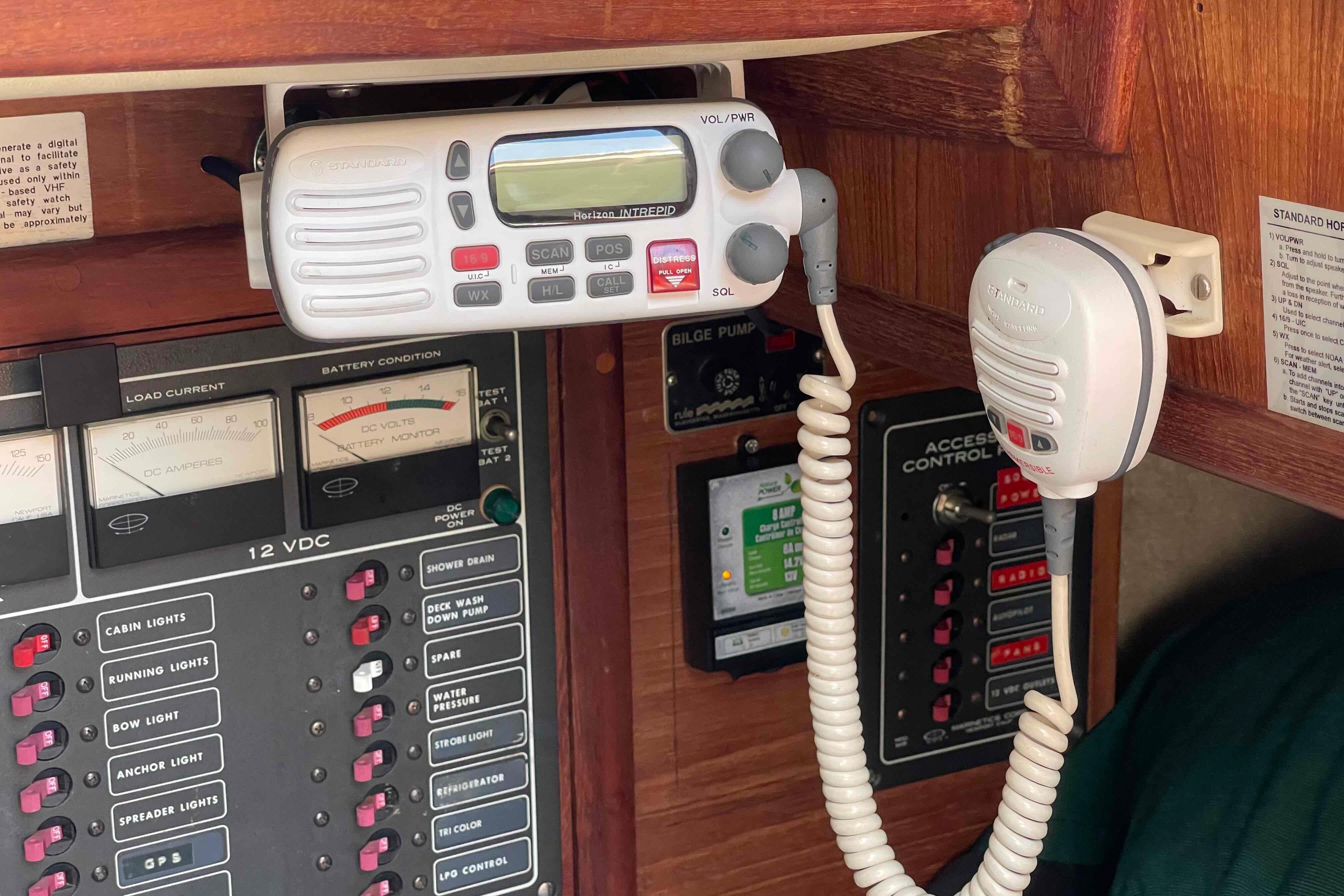 Control panel and radio equipment on a 1987 Pacific Seacraft 34 sailboat.