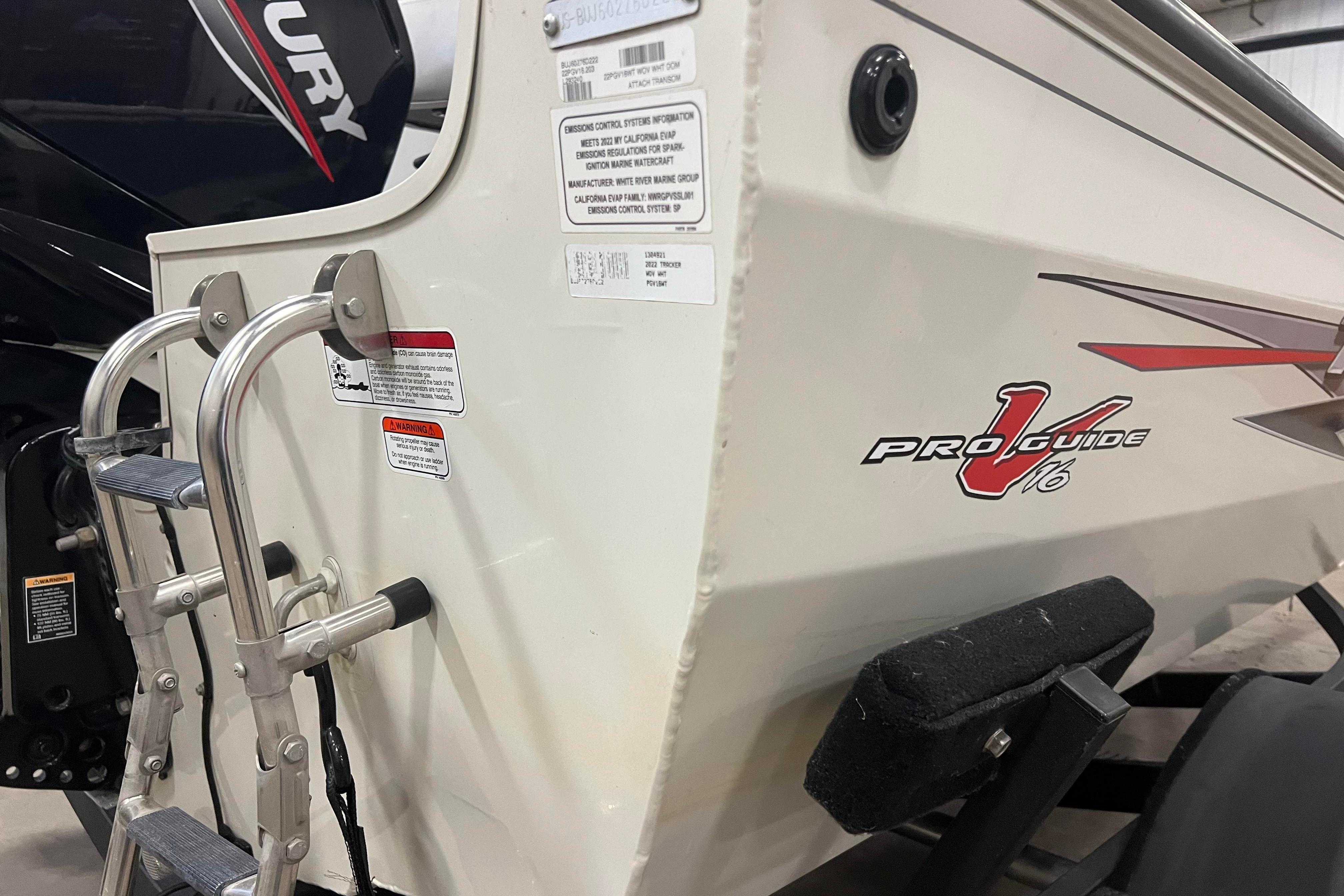 2022 Tracker Pro Guide V-16 WT boat with ladder and Mercury engine.