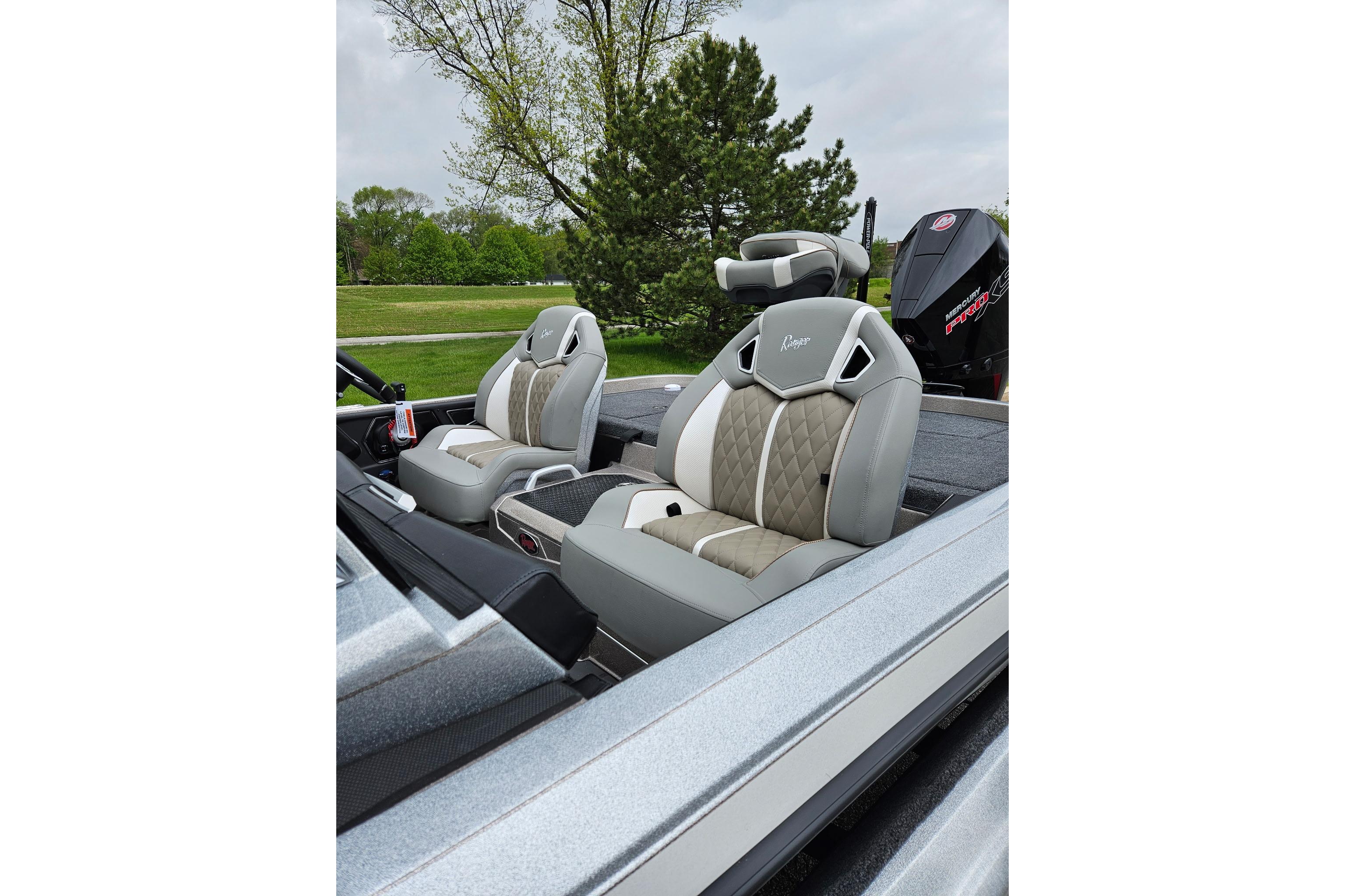 2026 Ranger Z521R Cup-Equipped boat interior with luxurious seating and sleek design.