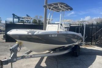 2016 Yamaha Boats 190 FSH Sport on trailer, parked outdoors under clear blue sky.