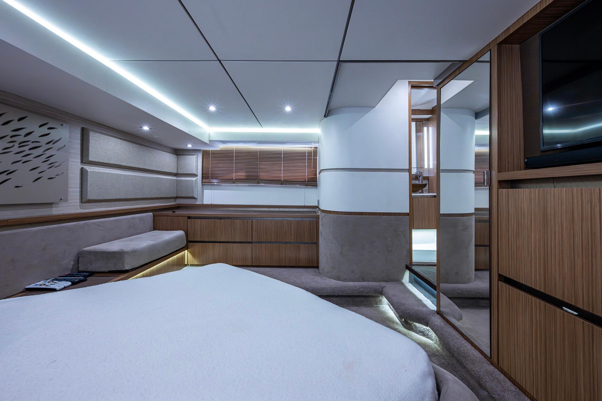 Luxurious interior of 2018 Sea Ray L550 Fly yacht with modern design and ambient lighting.
