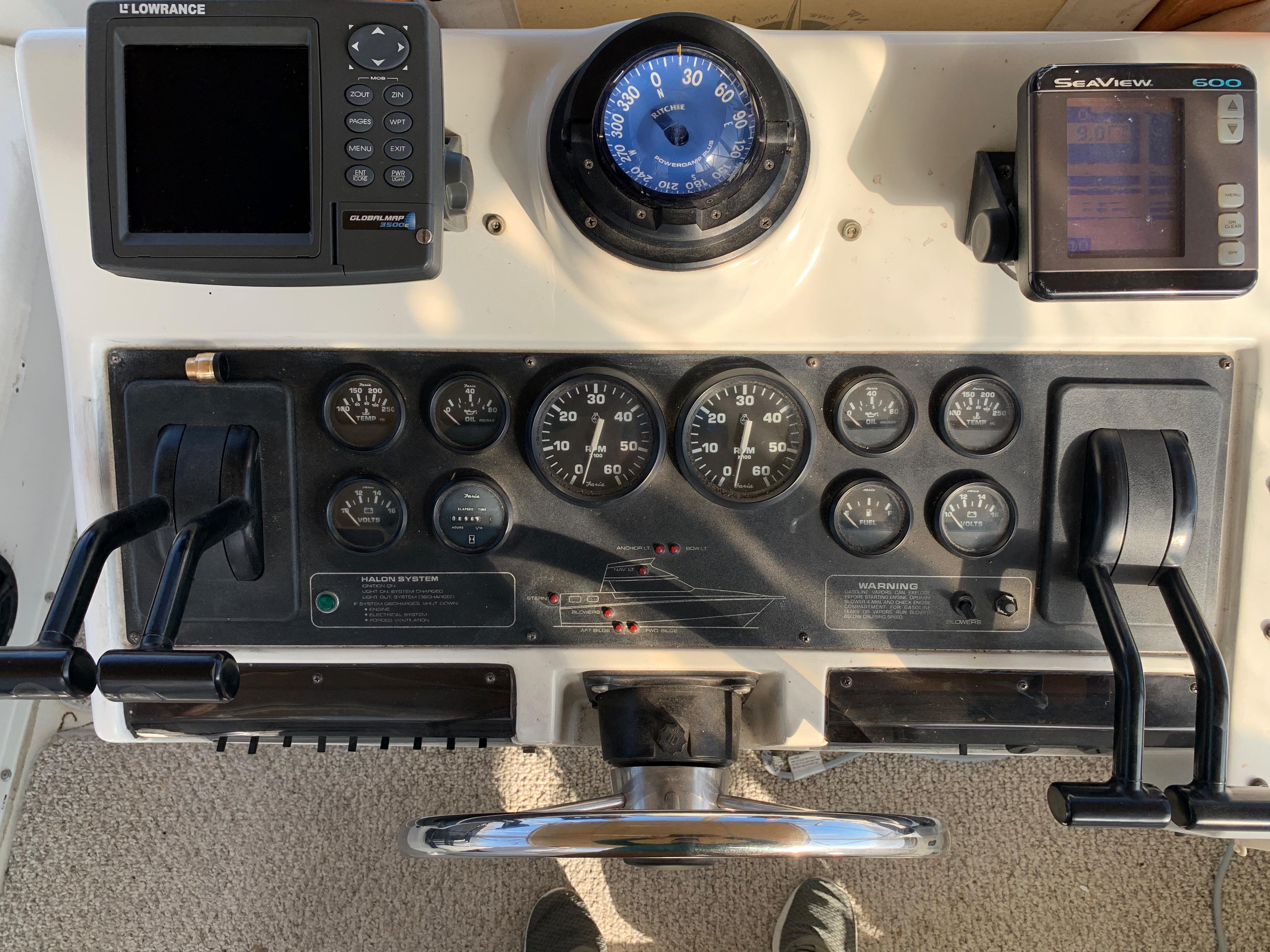 1992 Silverton 34 Aft Cabin Motor Yacht dashboard with navigation instruments and controls.