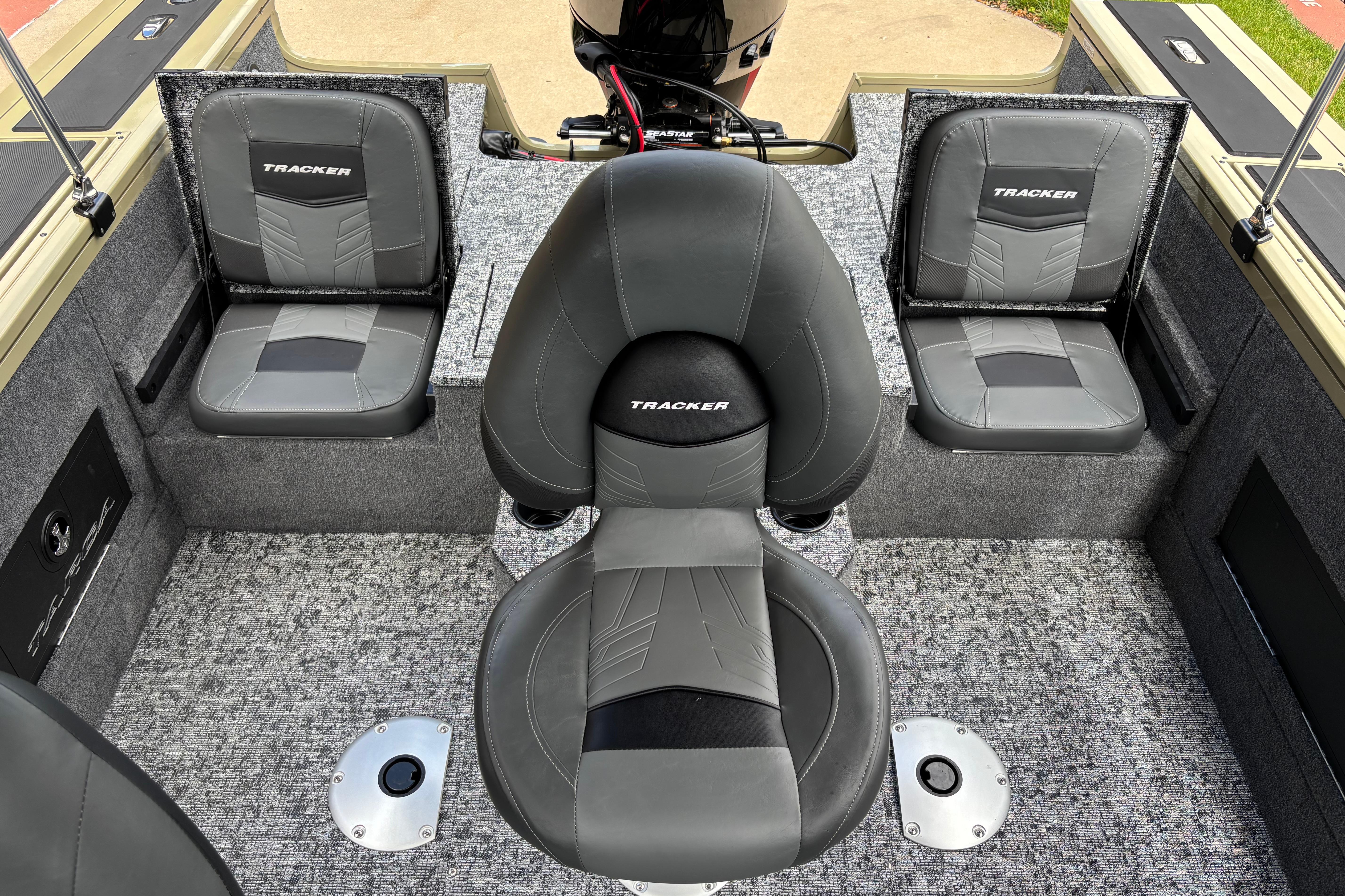 2026 Tracker Targa V-18 Combo boat interior with gray seating and carpeted flooring.
