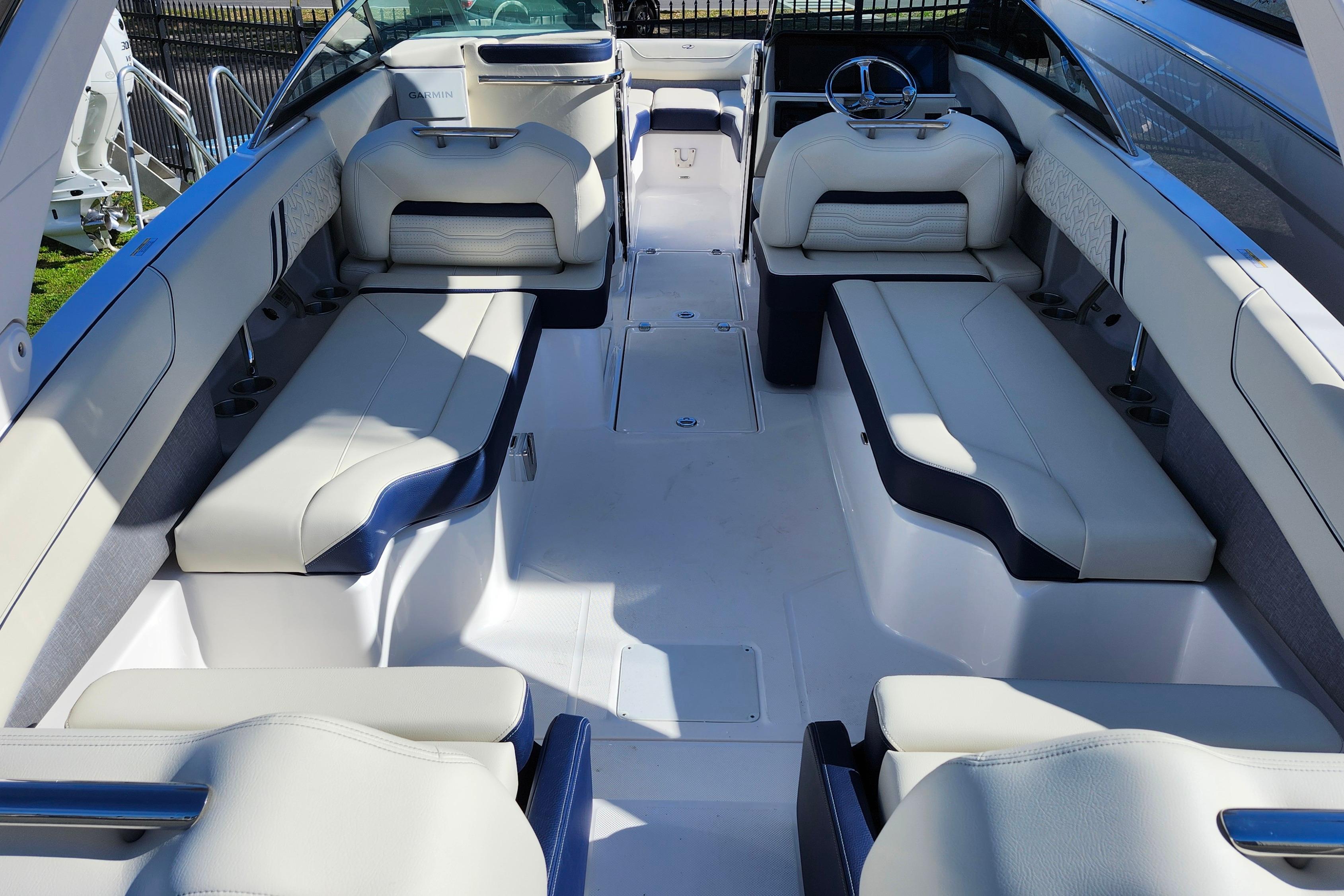 2026 Regal LX6 boat interior with luxurious white seating and modern design.