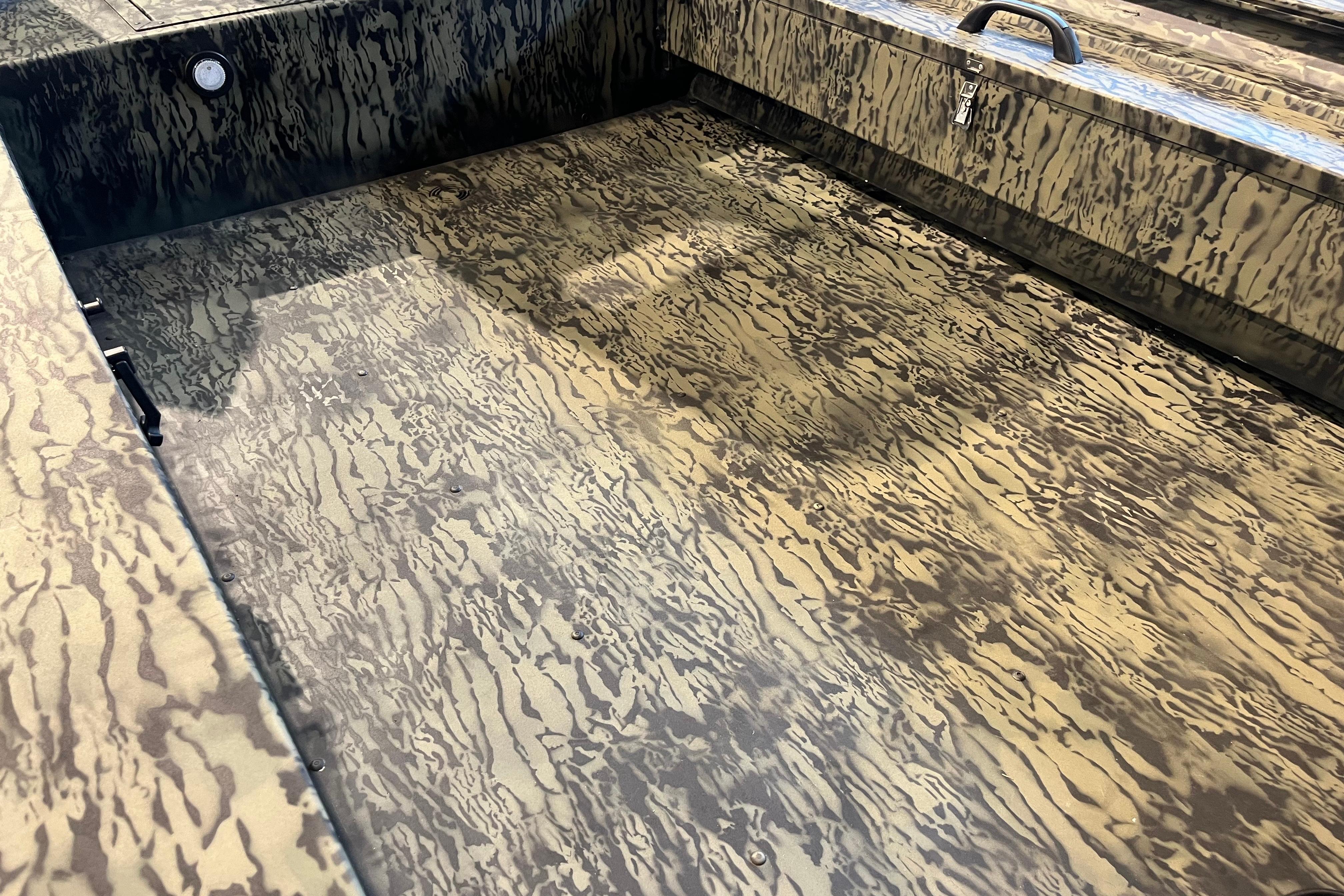 2026 Tracker Grizzly 1654 T Sportsman boat interior with camouflage pattern.