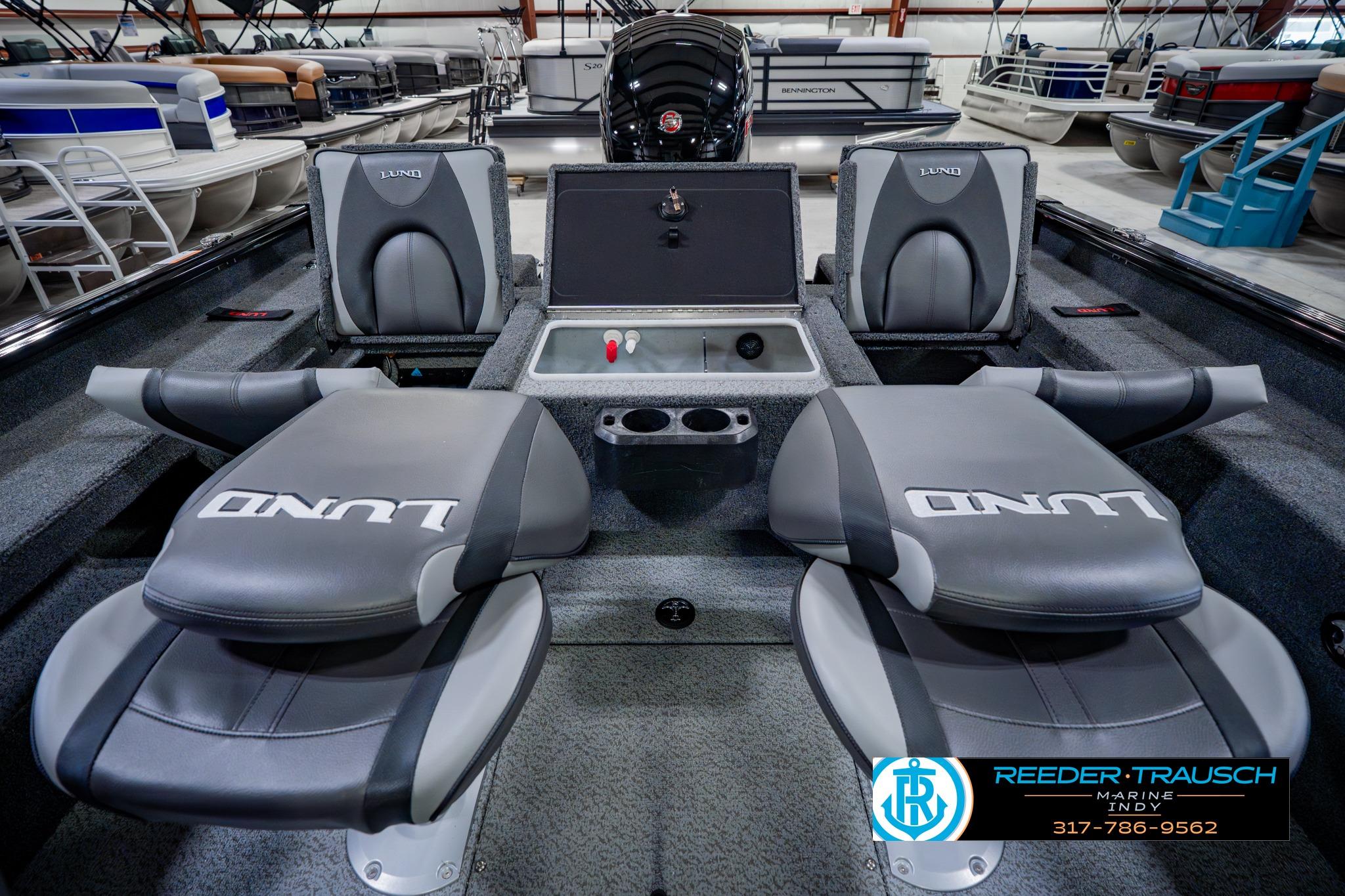 2026 Lund 1875 Impact XS boat interior with seating and storage, displayed at Reeder-Trausch Marine.