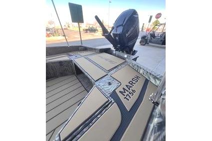 Tracker Grizzly 1756 T Marsh 2026 boat with outboard motor.