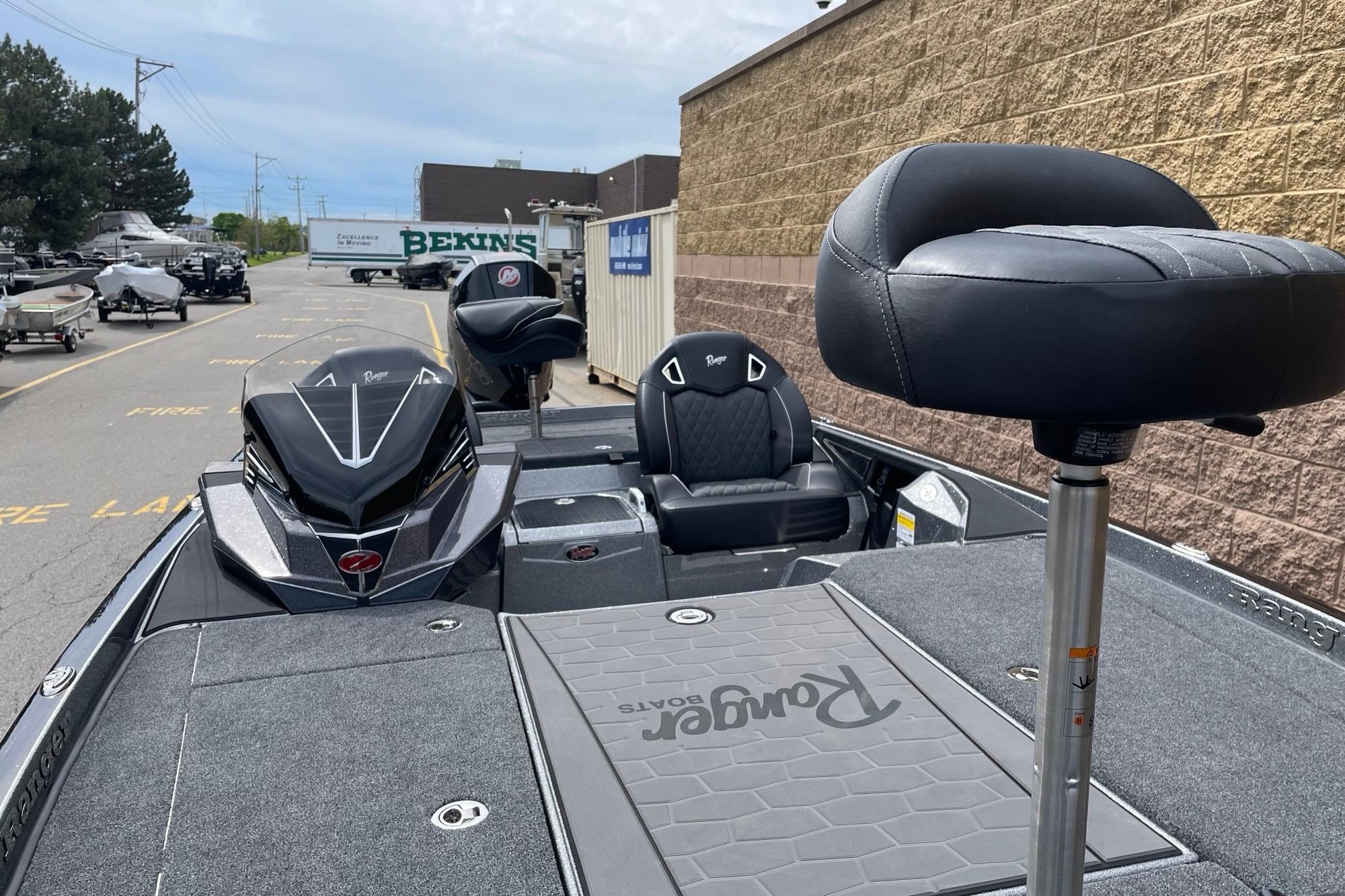 2026 Ranger Z520R boat with sleek seating and modern design in a parking area.