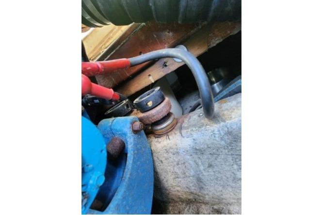 Engine component of a 1985 Wasque Down East Cruiser boat.