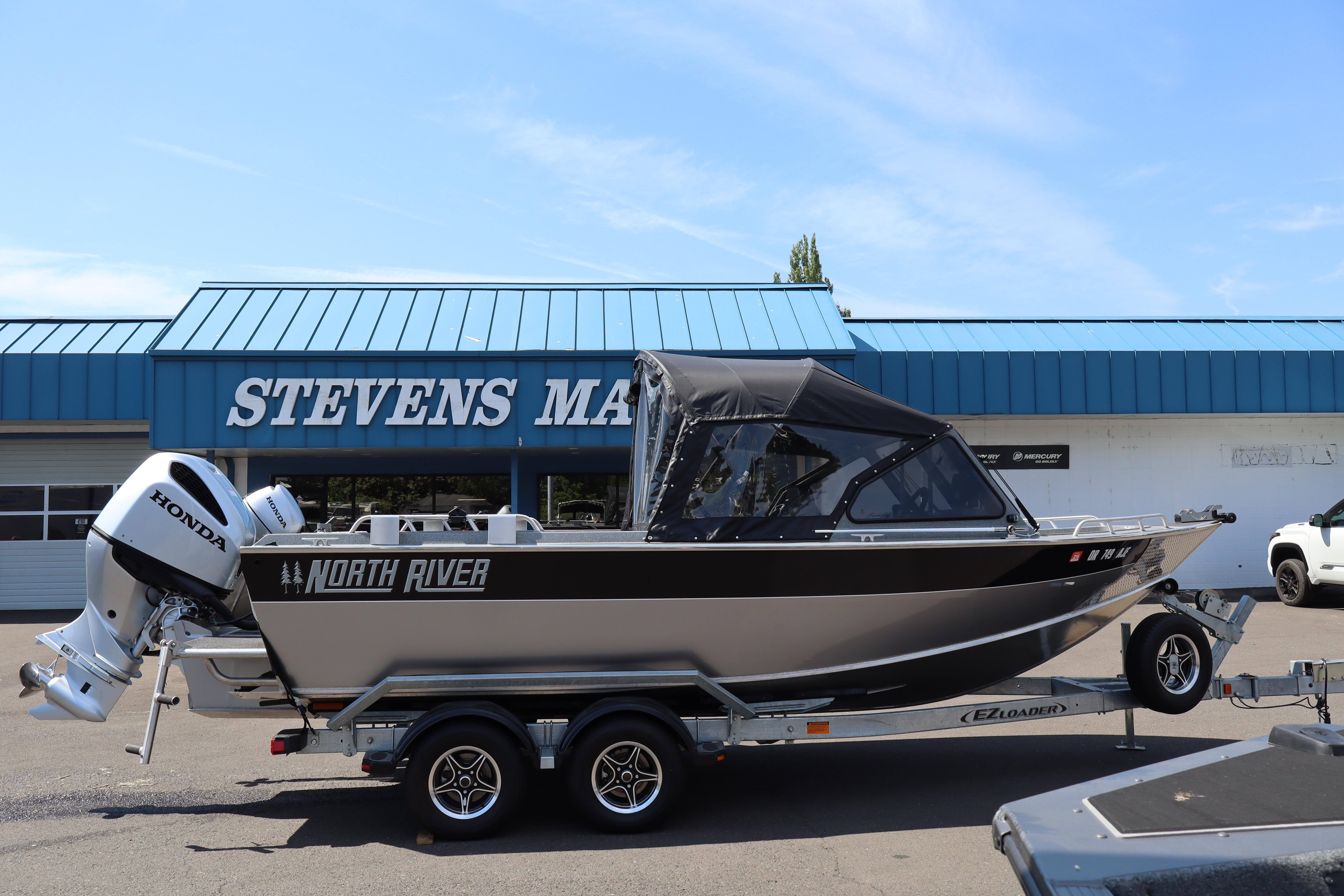 2025 NorthRiver SEAHAWK boat with Honda engine at Stevens Marine dealership.