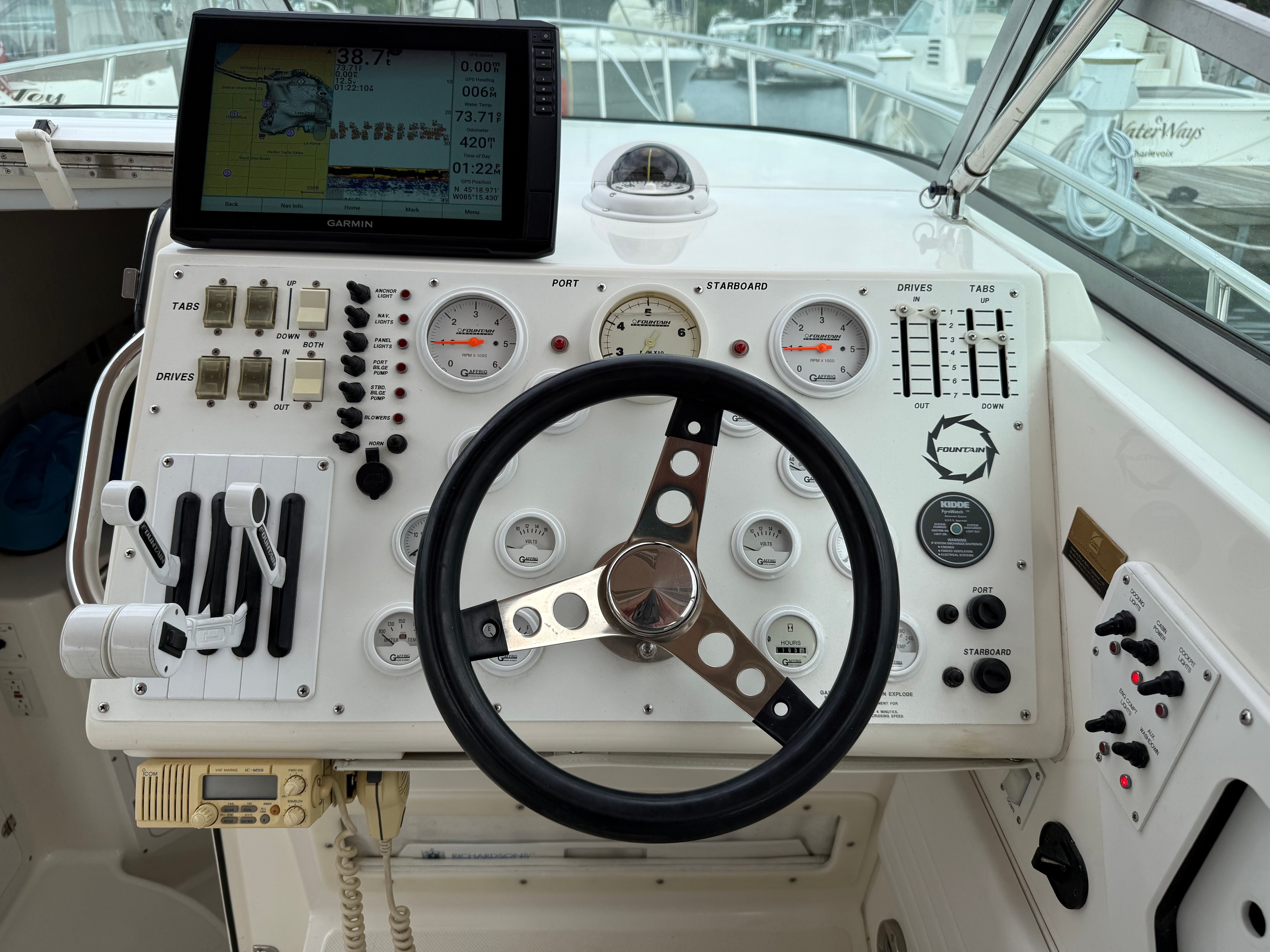 Dashboard of a 1999 Fountain 32 Sport Fish Cruiser with Garmin navigation system.