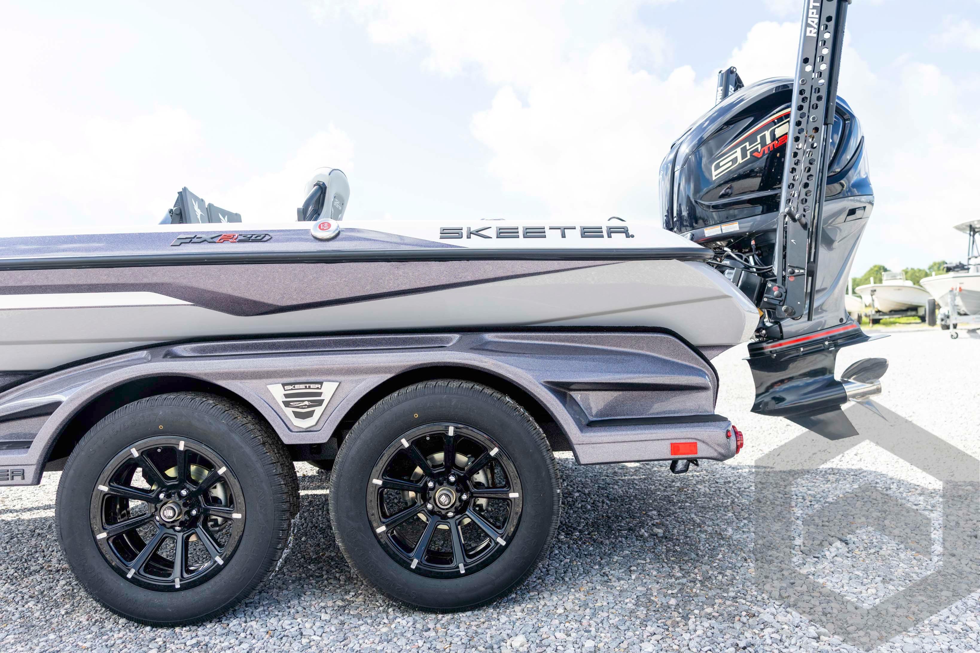 2026 Skeeter FXR20 FLEX boat with dual axle trailer and powerful outboard motor.
