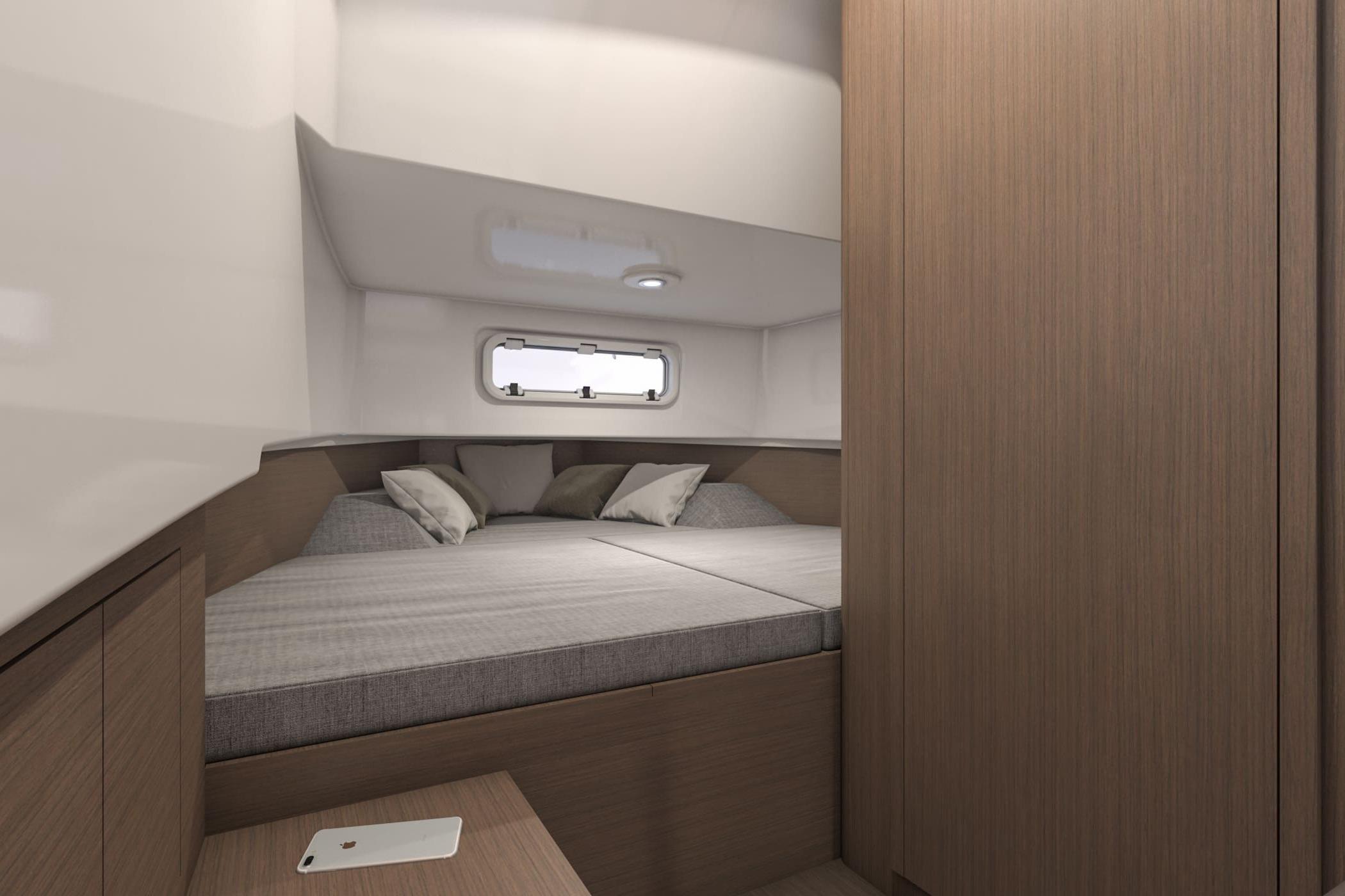 2026 Beneteau Flyer 9 SPACEdeck cabin interior with cozy bed and modern design.