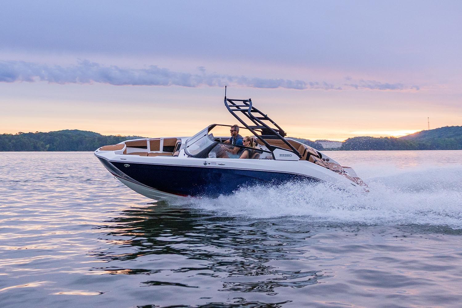Manufacturer Provided Image: 2026 Yamaha Boats 222SE cruising on a serene lake at sunset.