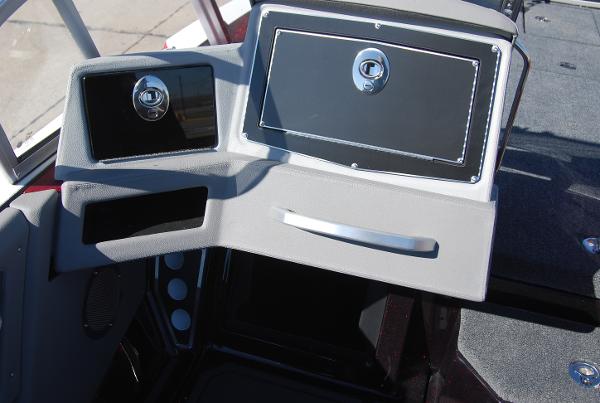 2024 Ranger 620FS Pro boat dashboard with storage compartments.