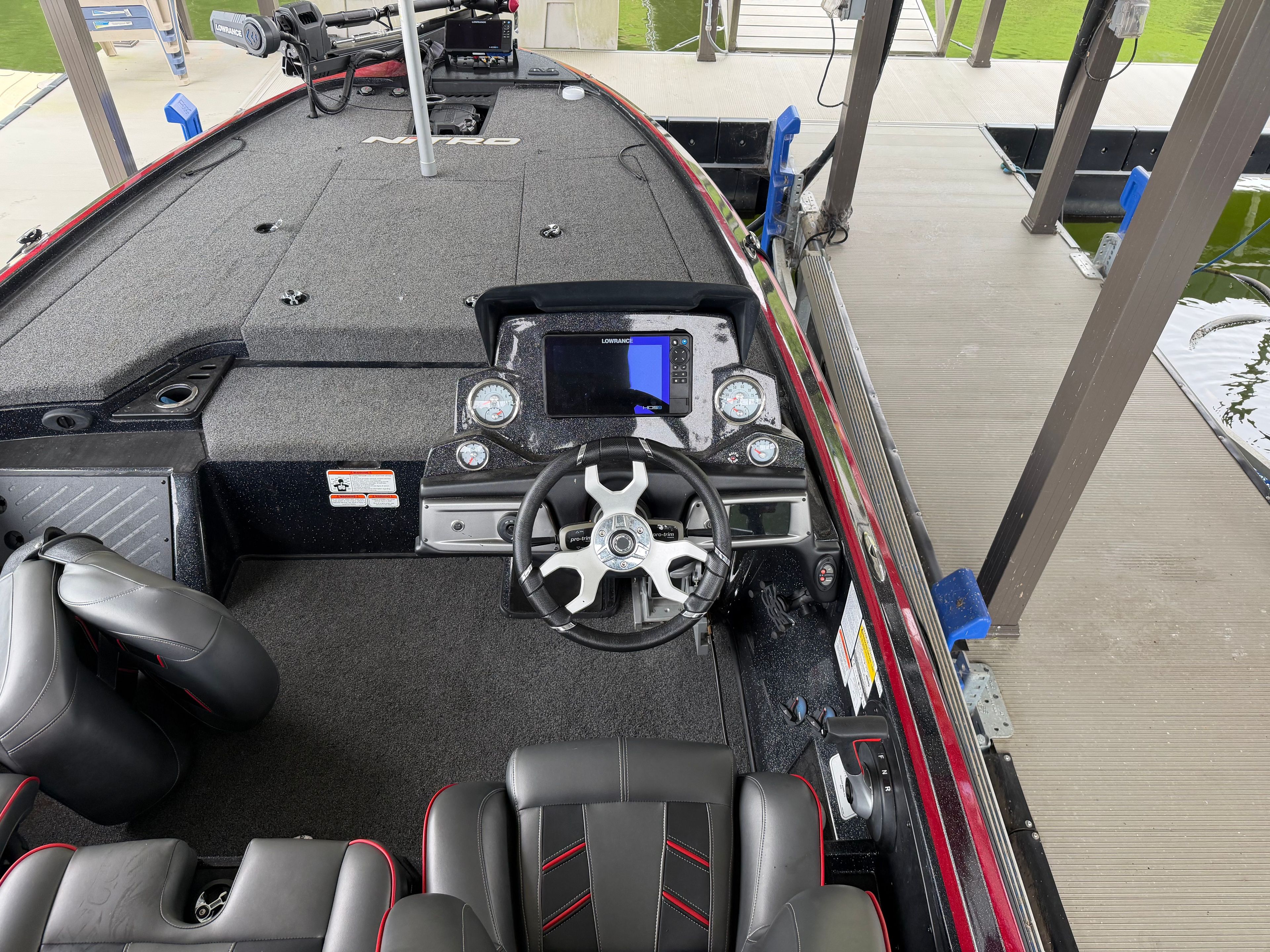 The image shows the cockpit of a 2024 Tracker Z19 boat with a modern helm.