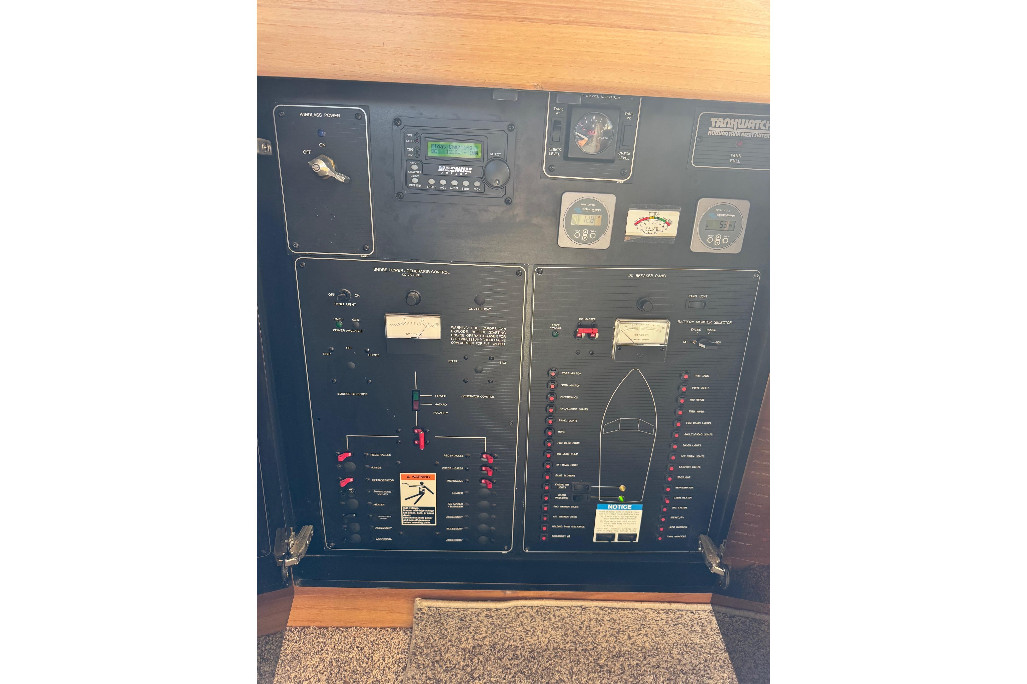 1998 Bayliner 3388 Command Bridge Motoryacht control panel with gauges and switches.