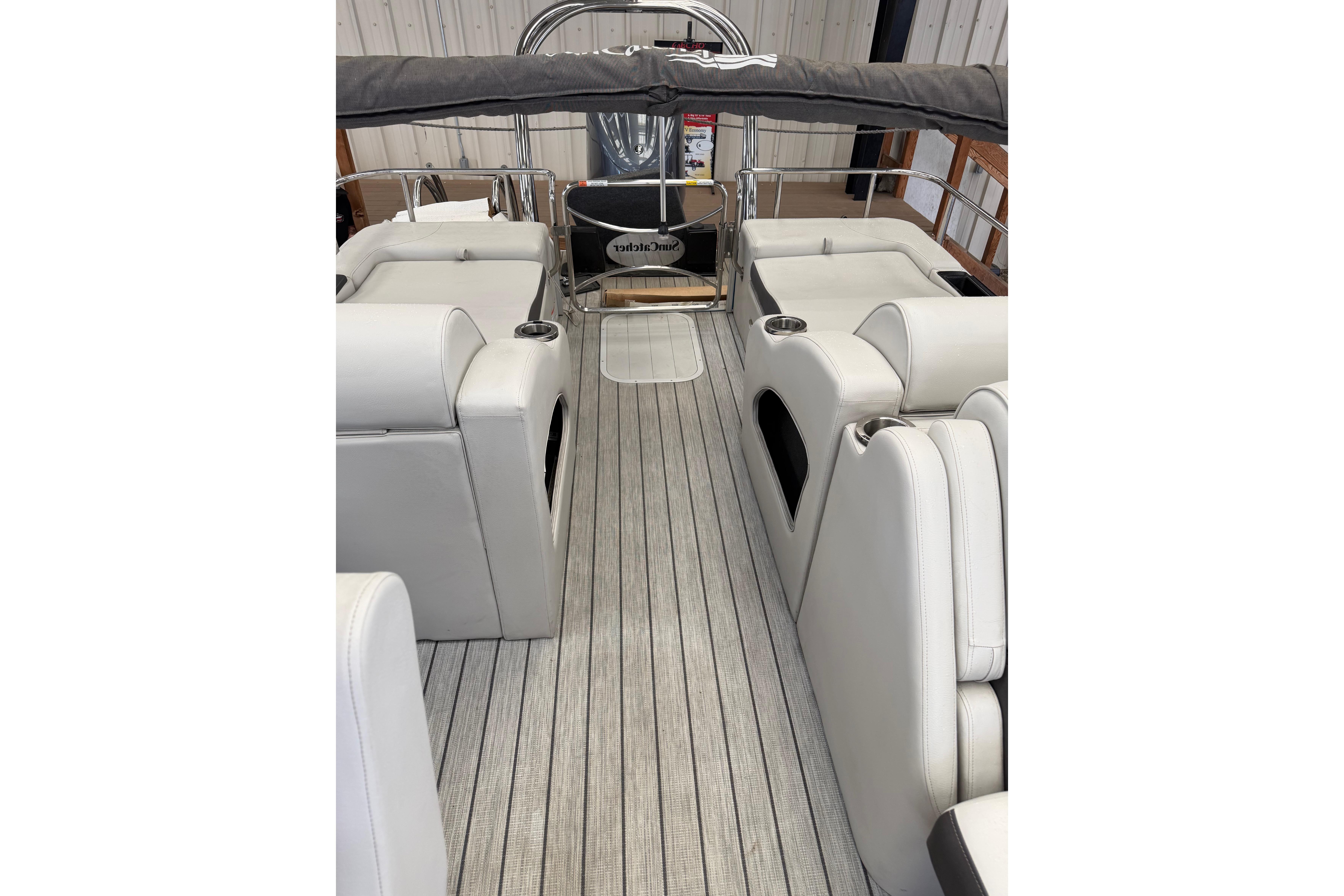 2024 SunCatcher Elite 326 SS DLX interior with luxurious seating and sleek design.