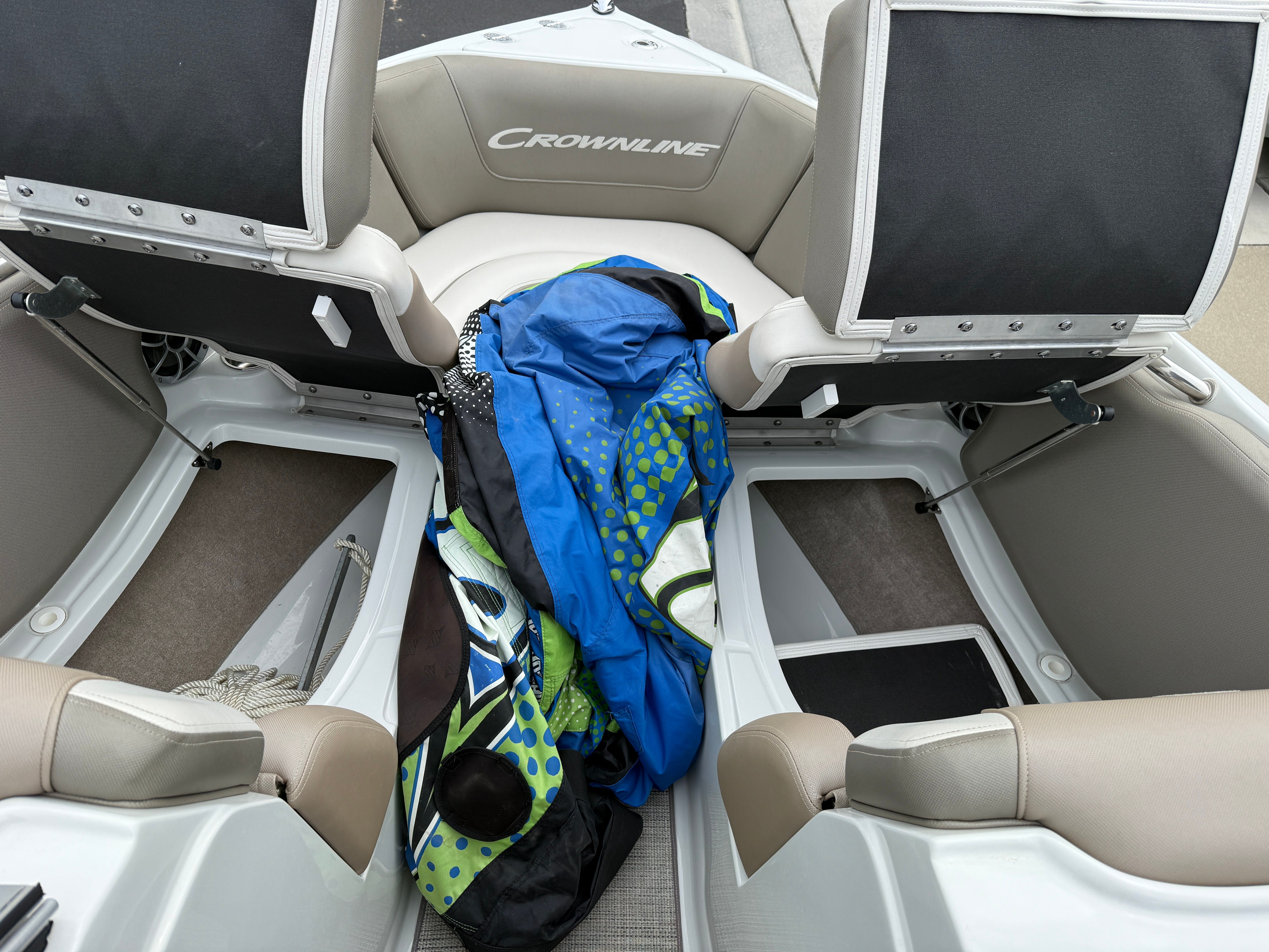 Interior of a Crownline 235 SS boat with blue gear.