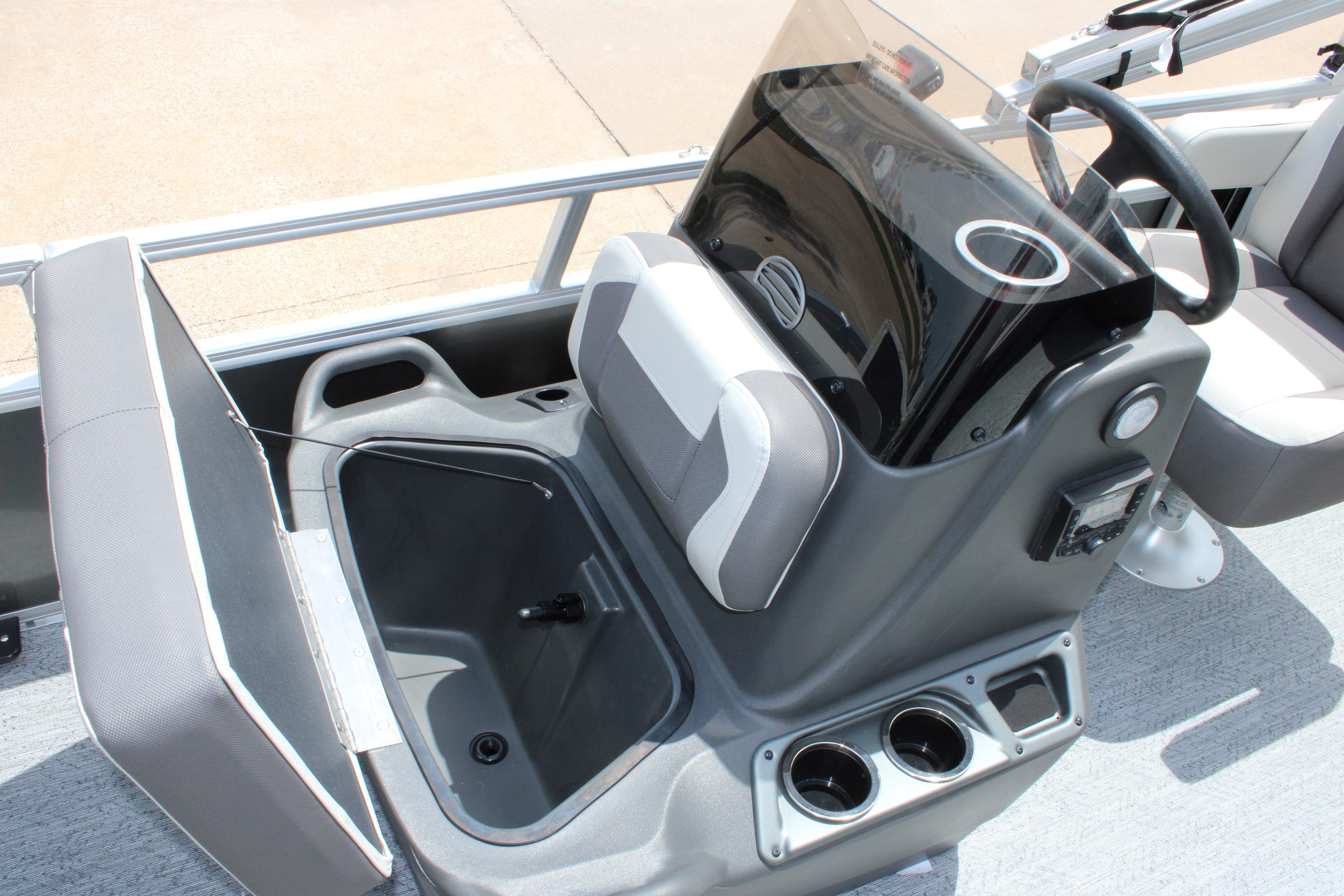 2026 Sun Tracker Bass Buggy 16 XL Select boat interior with storage and console.