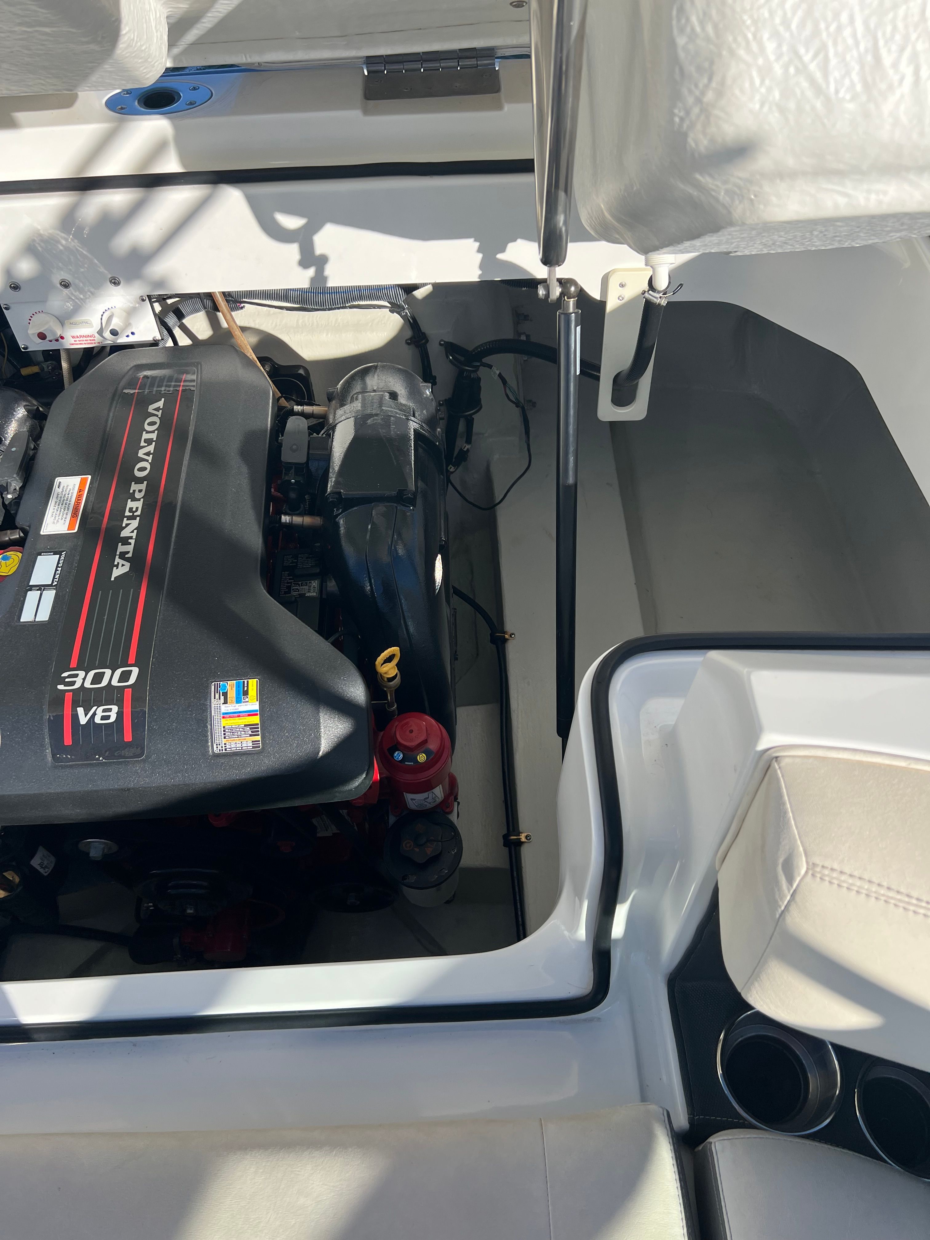 2012 Cobalt 232 boat engine compartment with Volvo Penta 300 V8 engine.