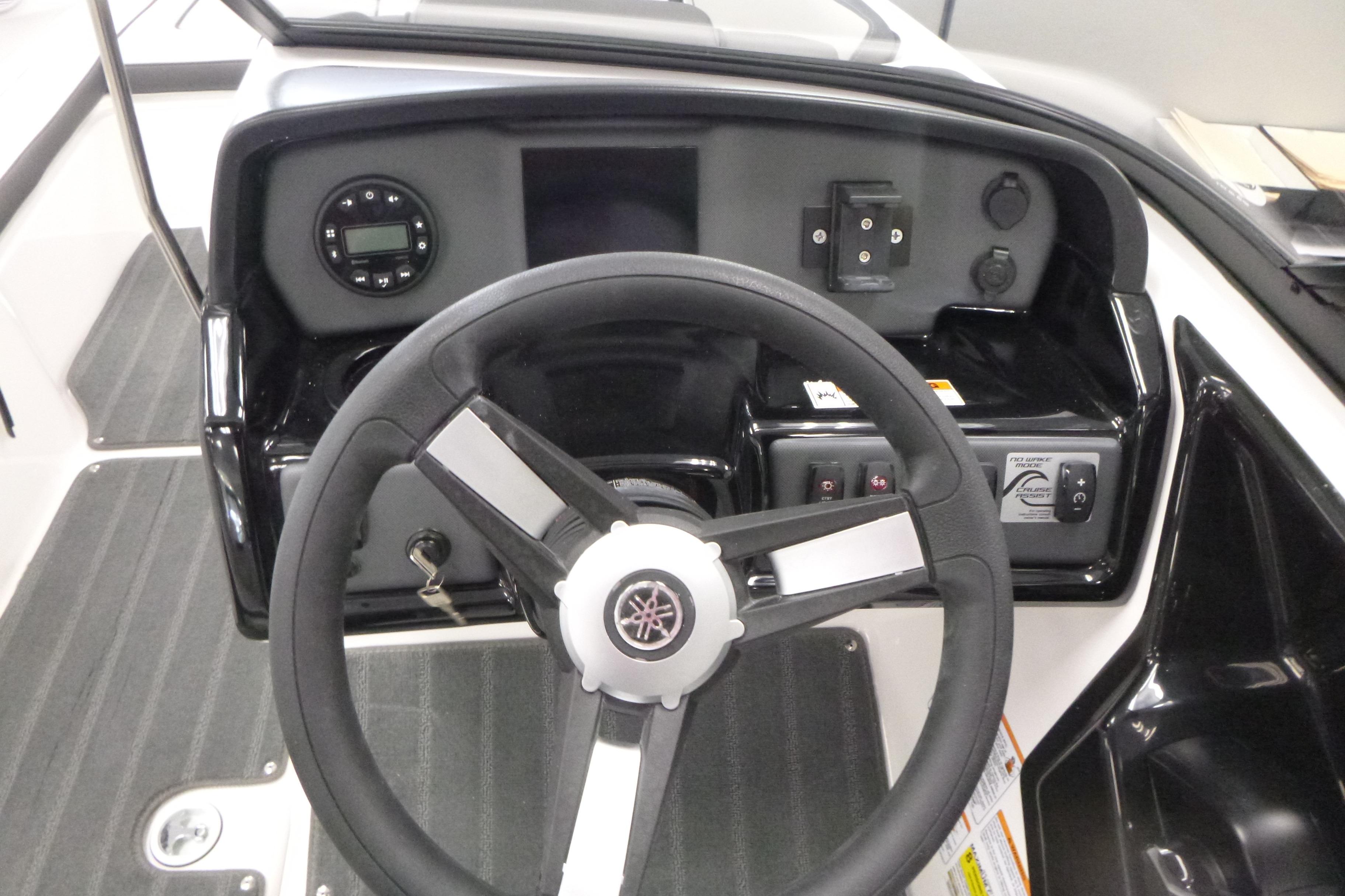 2026 Yamaha Boats AR190 dashboard with steering wheel and control panel.