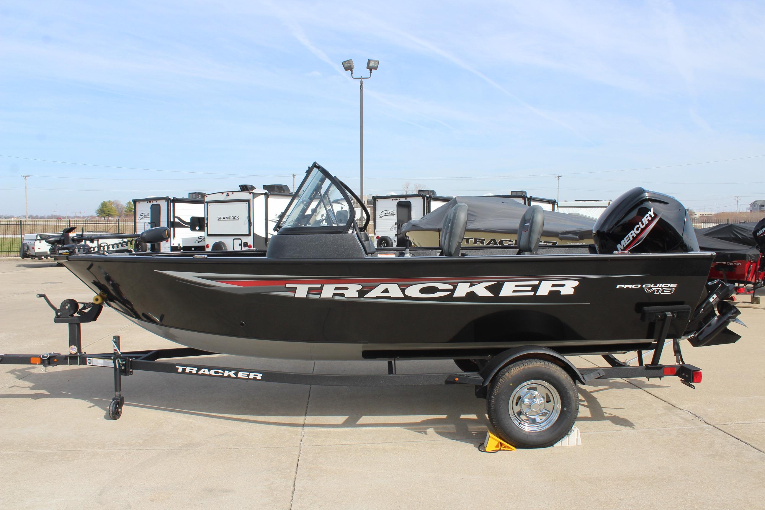 2026 Tracker Pro Guide V-16 WT boat on trailer in outdoor setting.