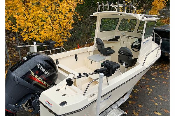 Manufacturer Provided Image: Arima Sea Chaser 19 Yellowtail Edition 2026 with Yamaha engine, autumn leaves background.