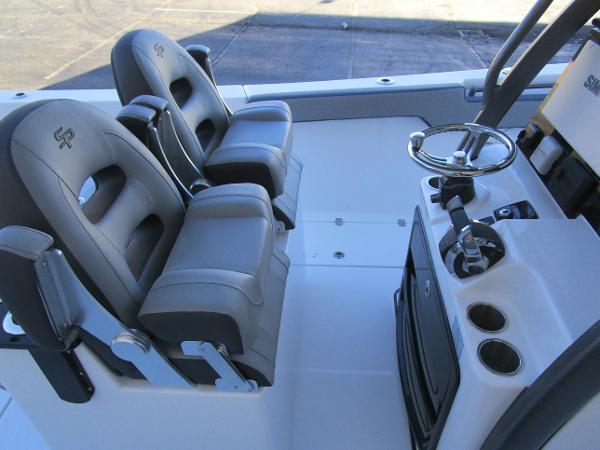 2025 Sea Pro 292 Offshore boat cockpit with dual seats and steering console.