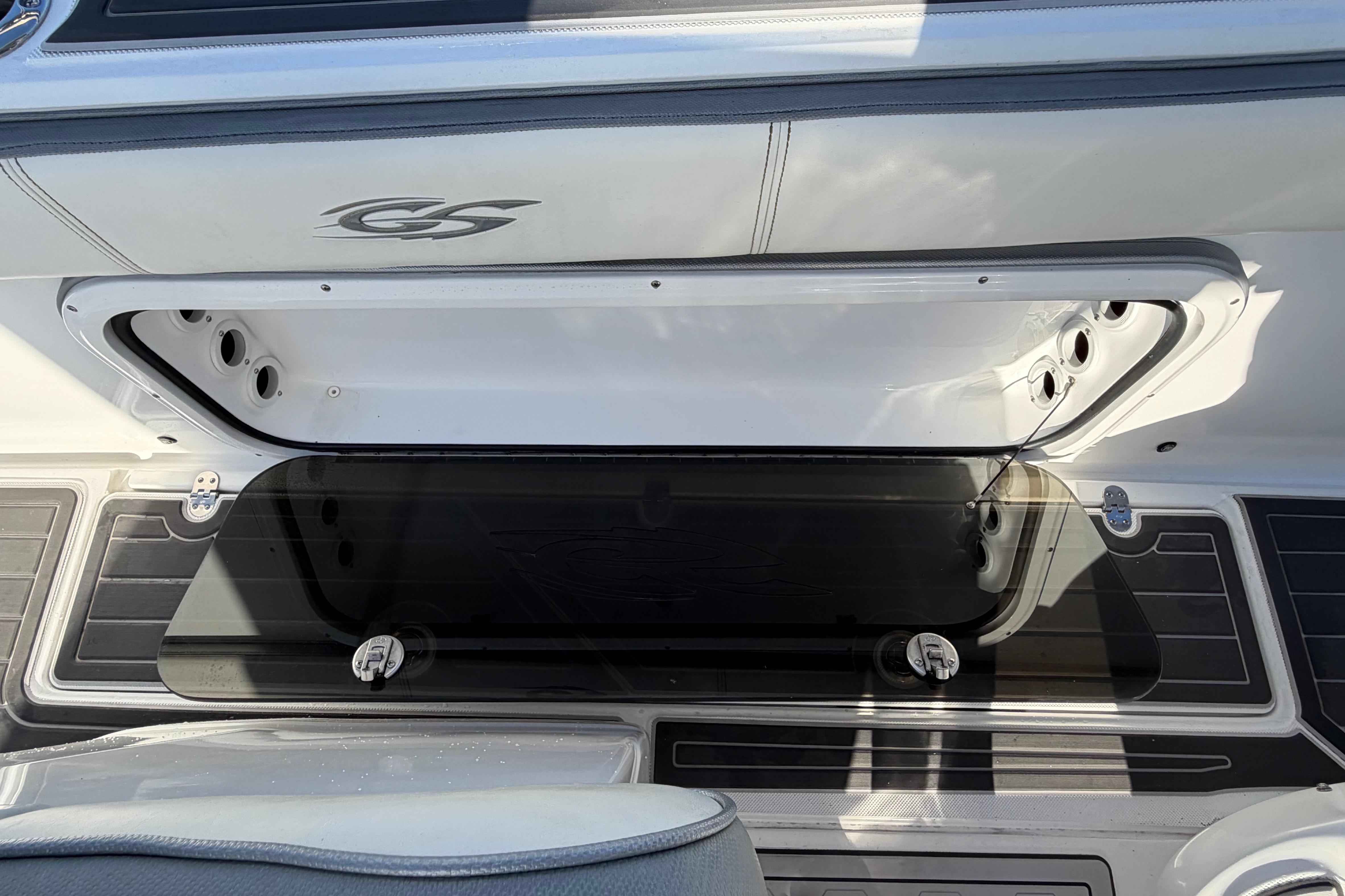 2022 Glasstream 328 Pro-XS boat interior with storage compartment and sleek design.
